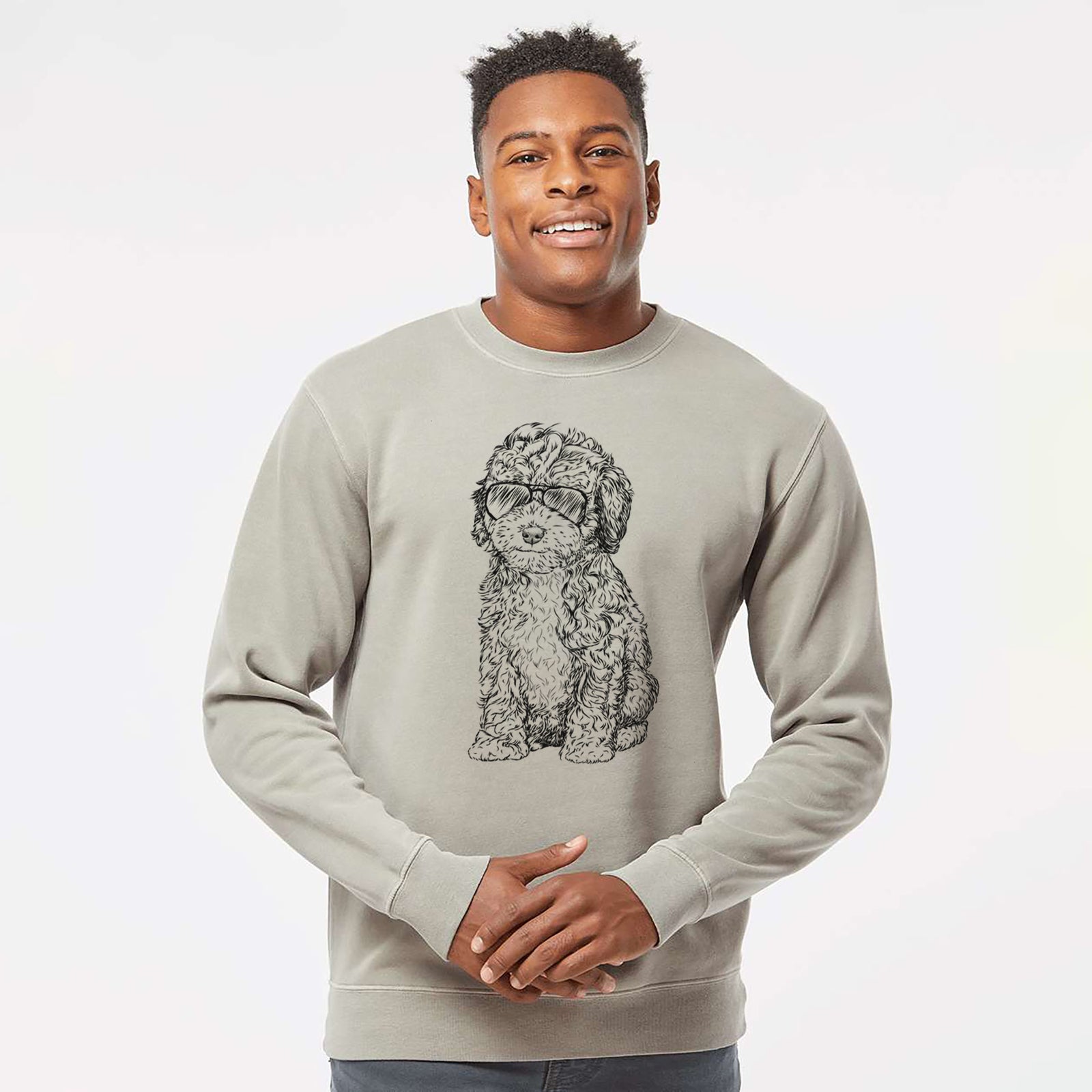 Hand-drawn sketch of Sweet Tea the Mini Doodle wearing aviator sunglasses on a Cement Unisex pigment dyed crew sweatshirt