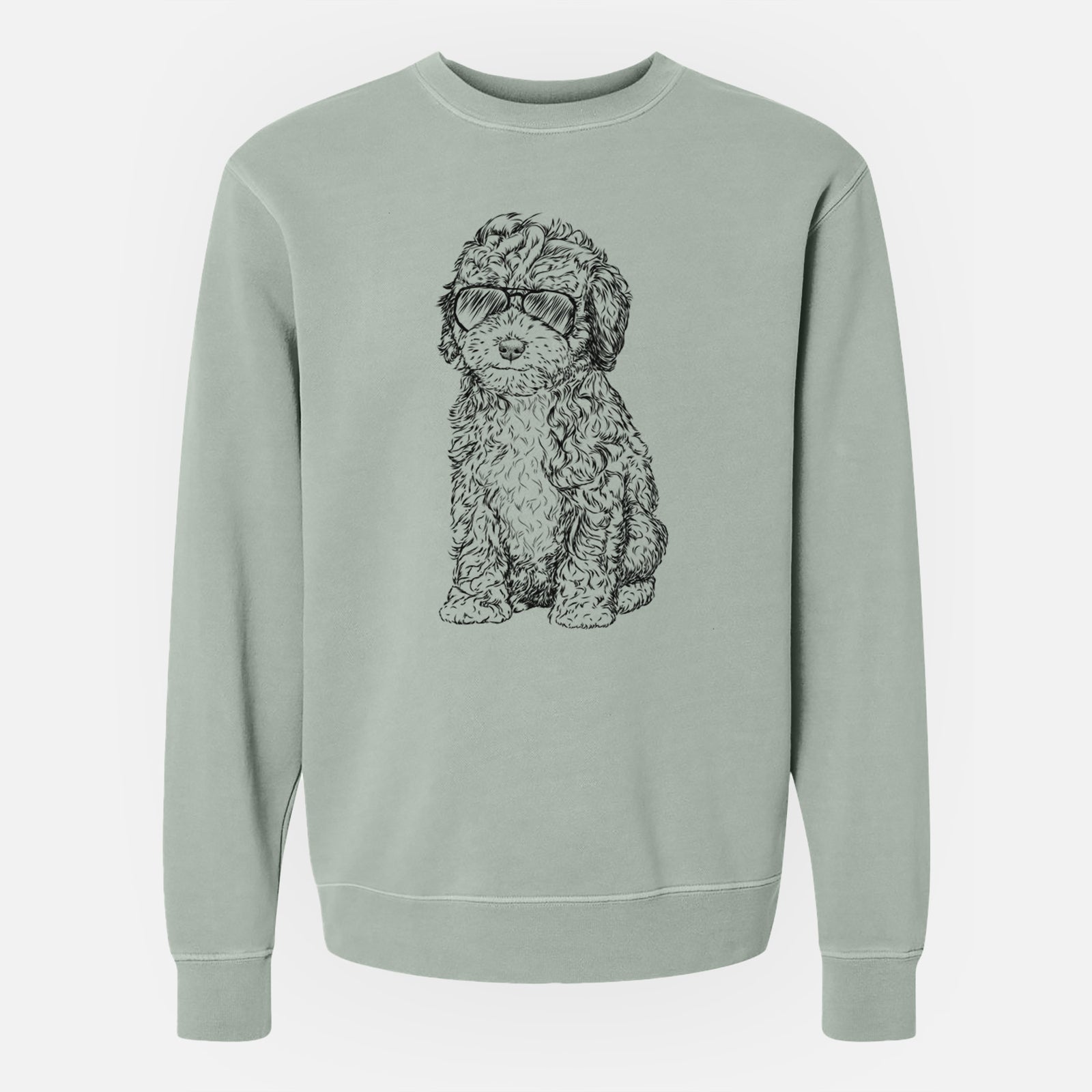 Hand-drawn sketch of Sweet Tea the Mini Doodle wearing aviator sunglasses on a Sage Unisex pigment dyed crew sweatshirt