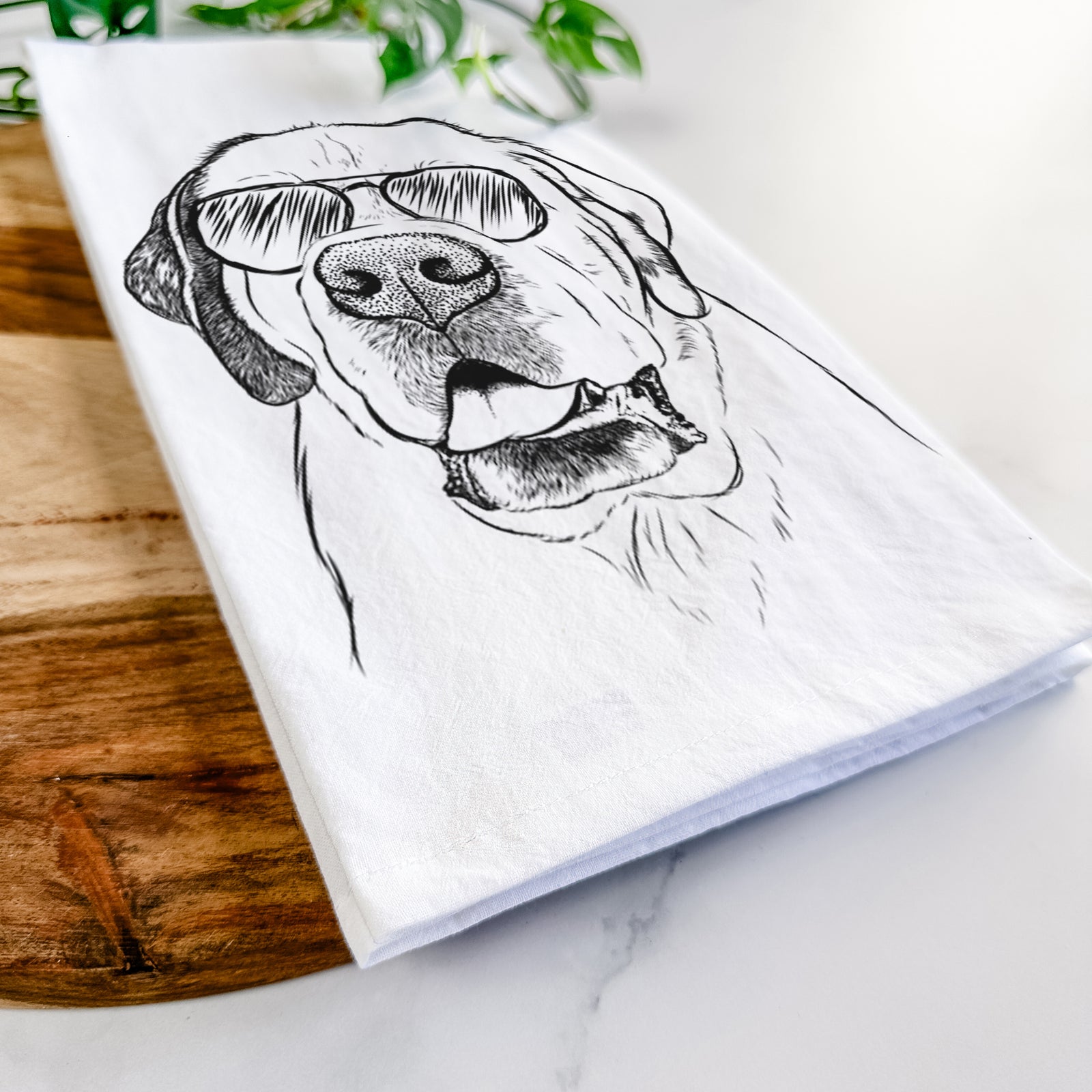 Hand-drawn sketch of Wendy the Saint Bernard wearing aviator sunglasses on a tea towel