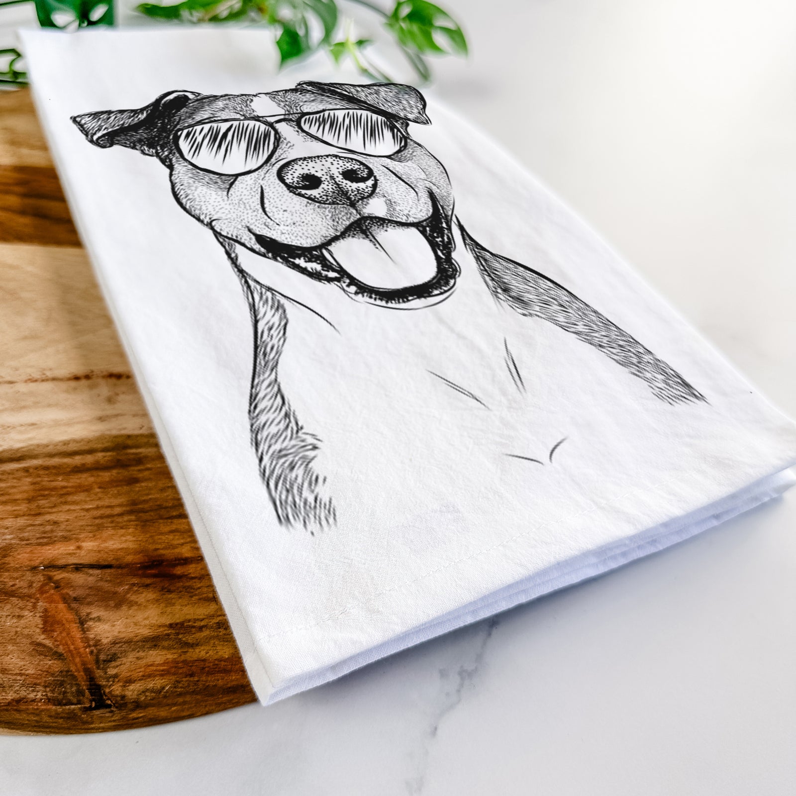 Hand-drawn sketch of Wendy the Mixed Breed wearing aviator sunglasses on a tea towel