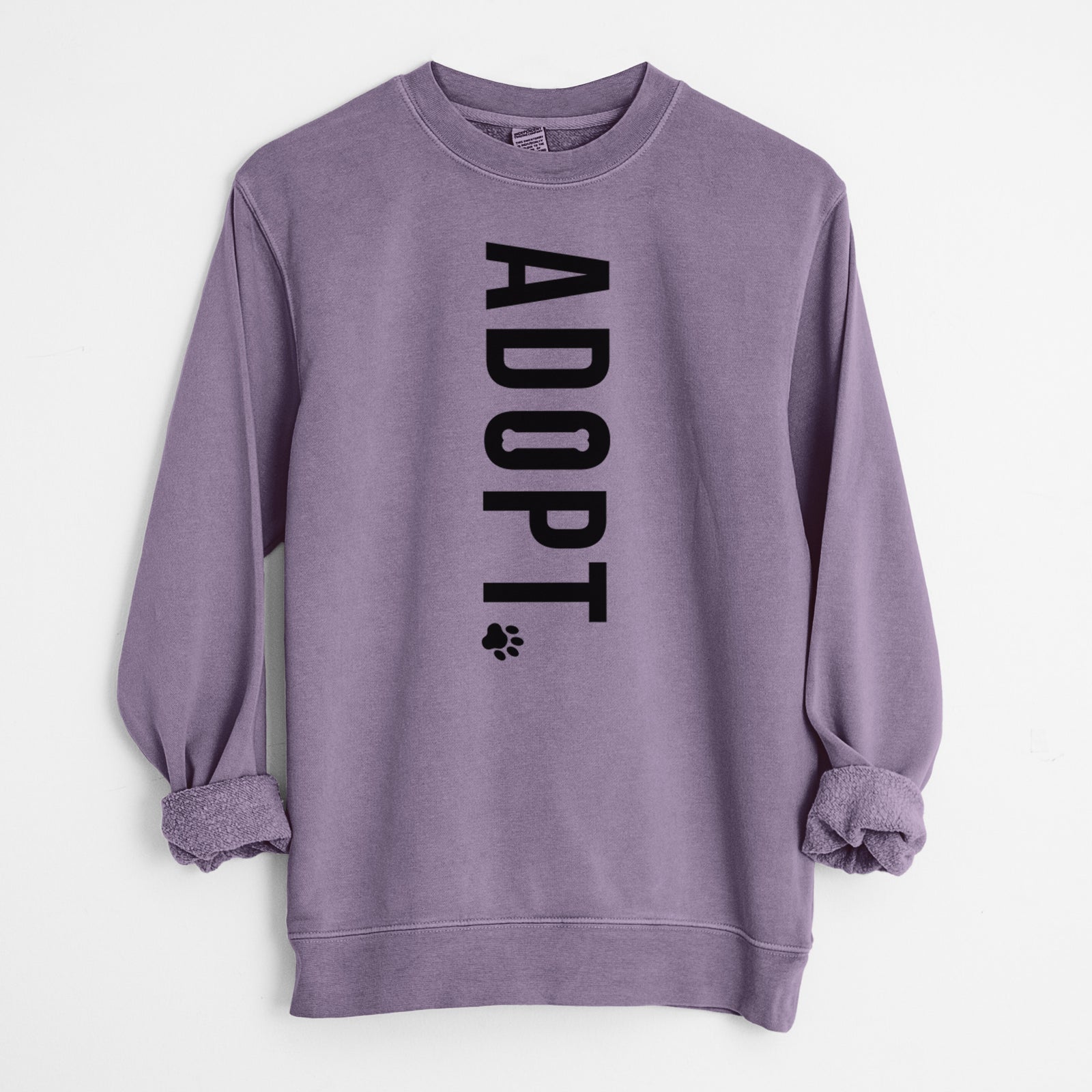 'Adopt' design on a Plum Unisex pigment dyed crew sweatshirt