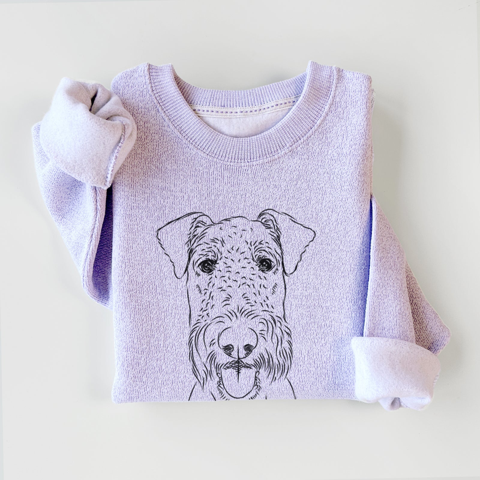 Hand-drawn sketch of Andy the Airedale Terrier on an Ice Purple knit sweatshirt