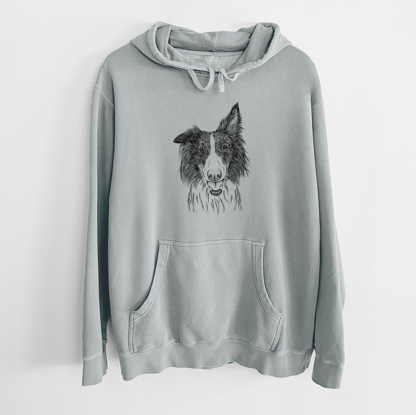 Hand-drawn sketch of Archie the Silken Windhound on a Sage Unisex pigment dyed hoodie