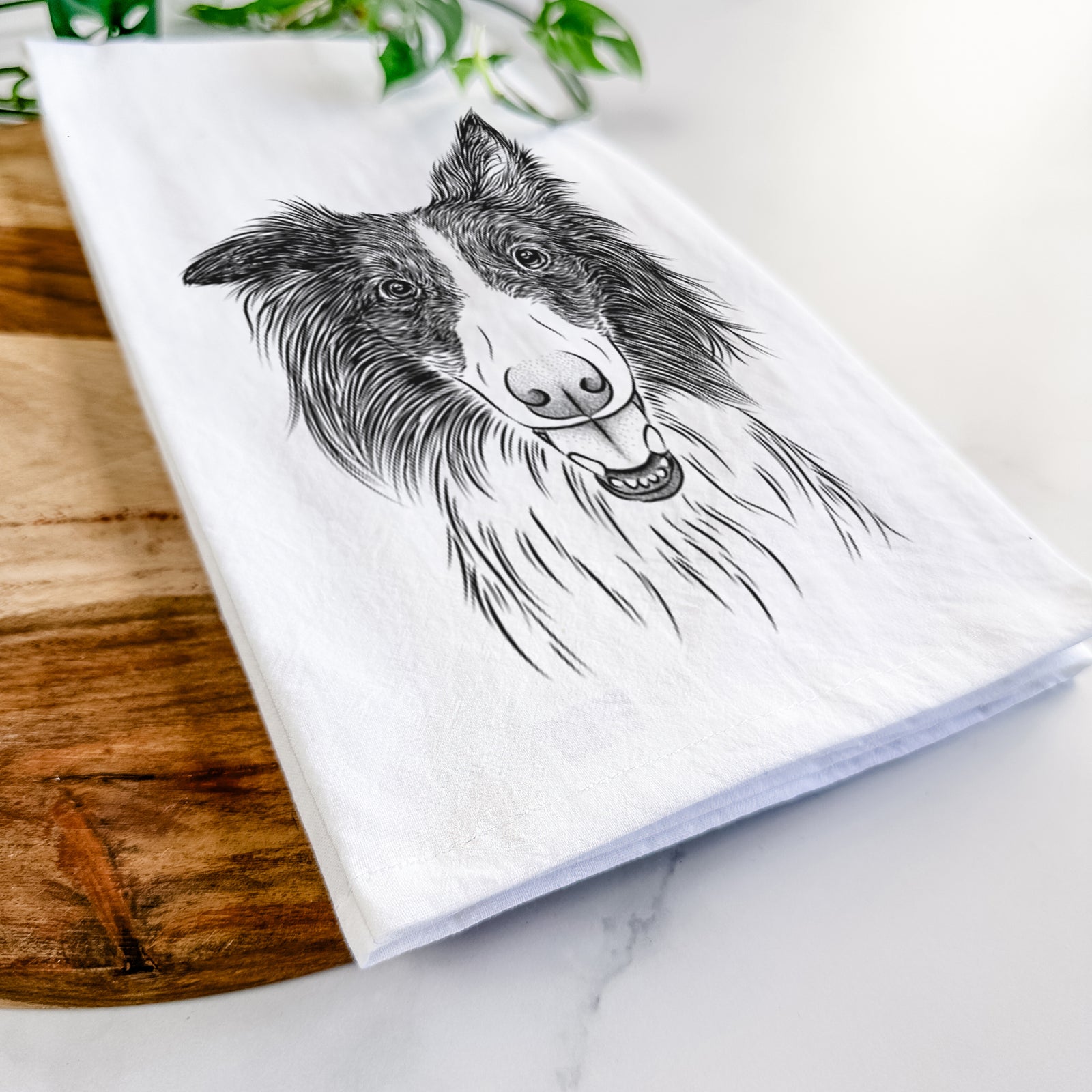 Hand-drawn sketch of Archie the Silken Windhound on a tea towel