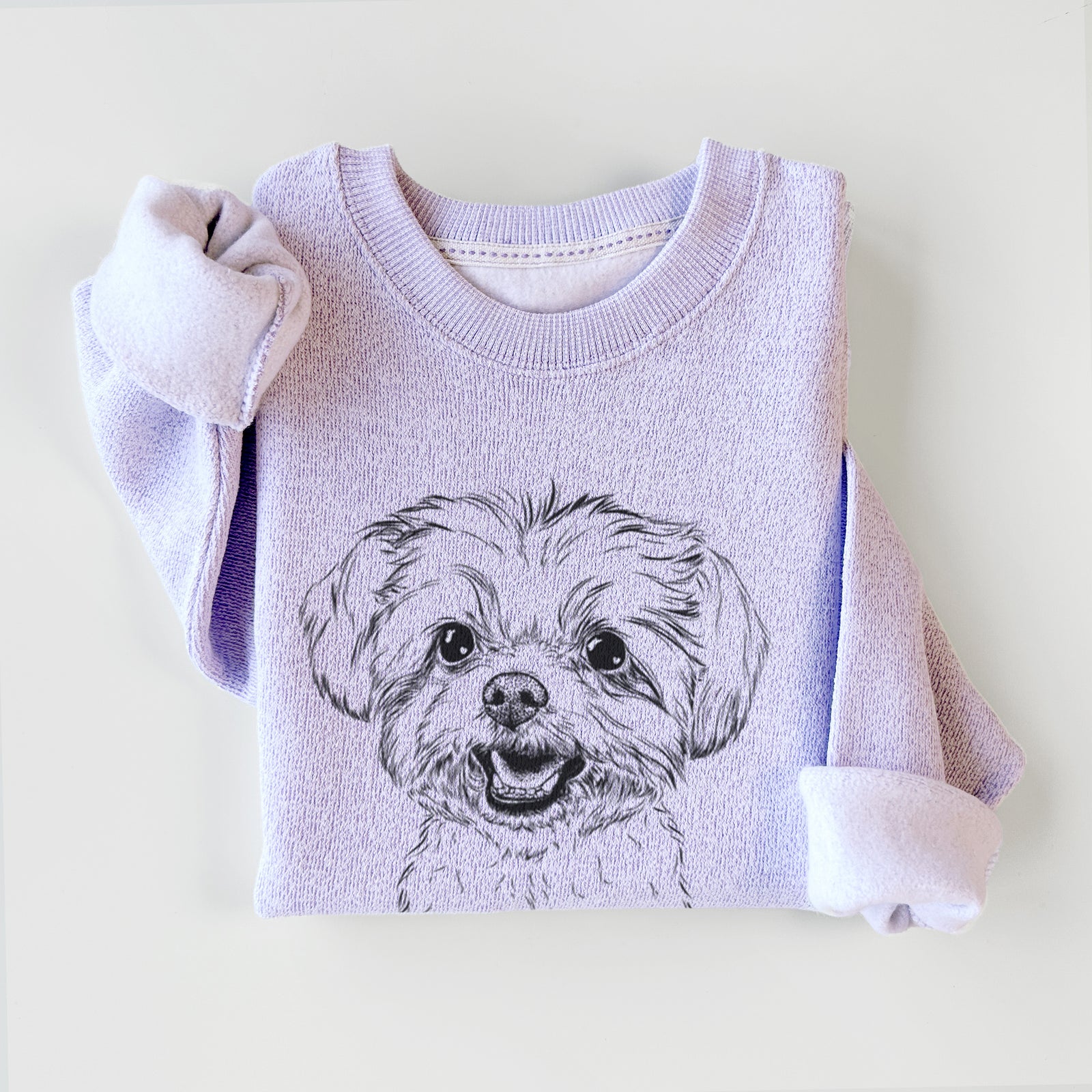 Hand-drawn sketch of Aspen the Morkie on an Ice Purple knit sweatshirt