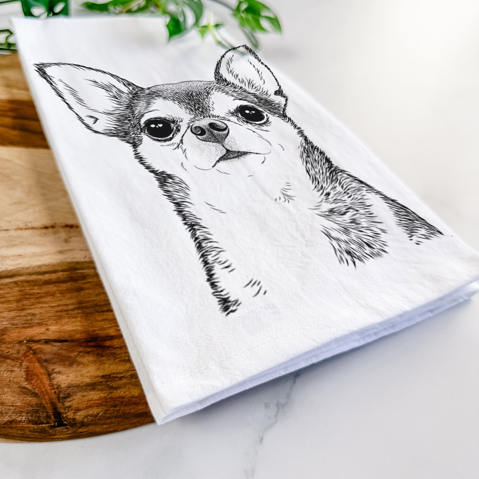 Hand-drawn sketch of Baby the Chihuahua on a tea towel