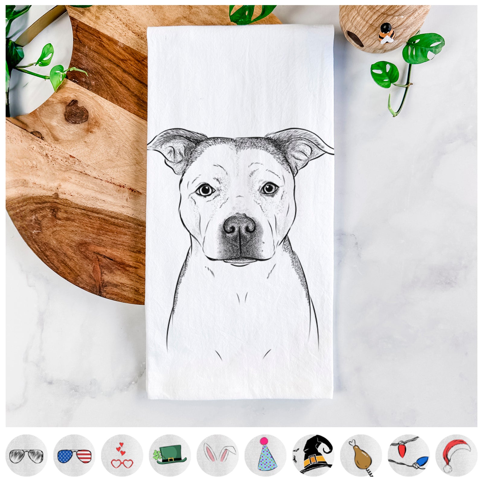 Hand-drawn sketch of Bailey the Pitbull on a tea towel, shown with icons of the other available costume styles