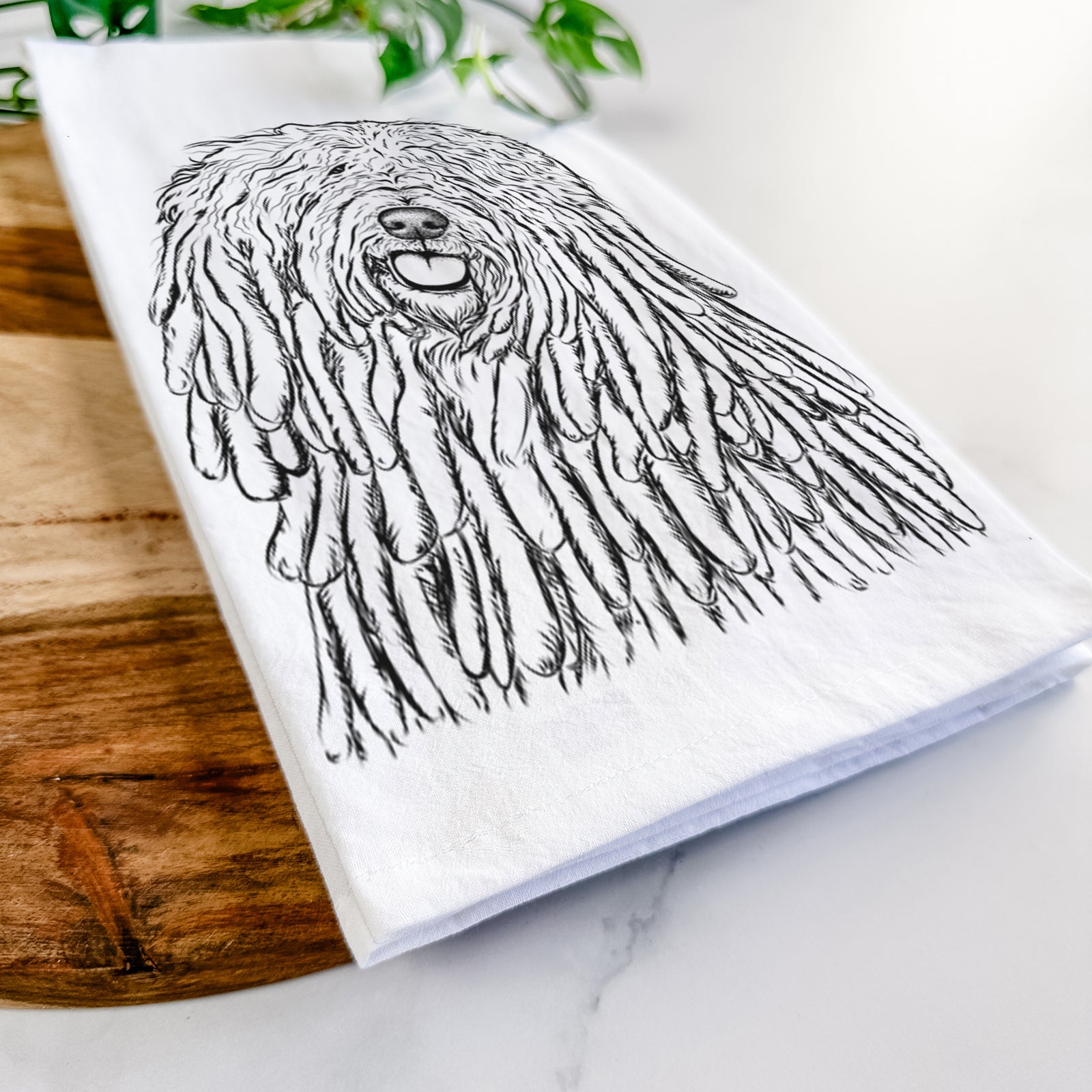 Hand-drawn sketch of Barry the Komondor on a tea towel