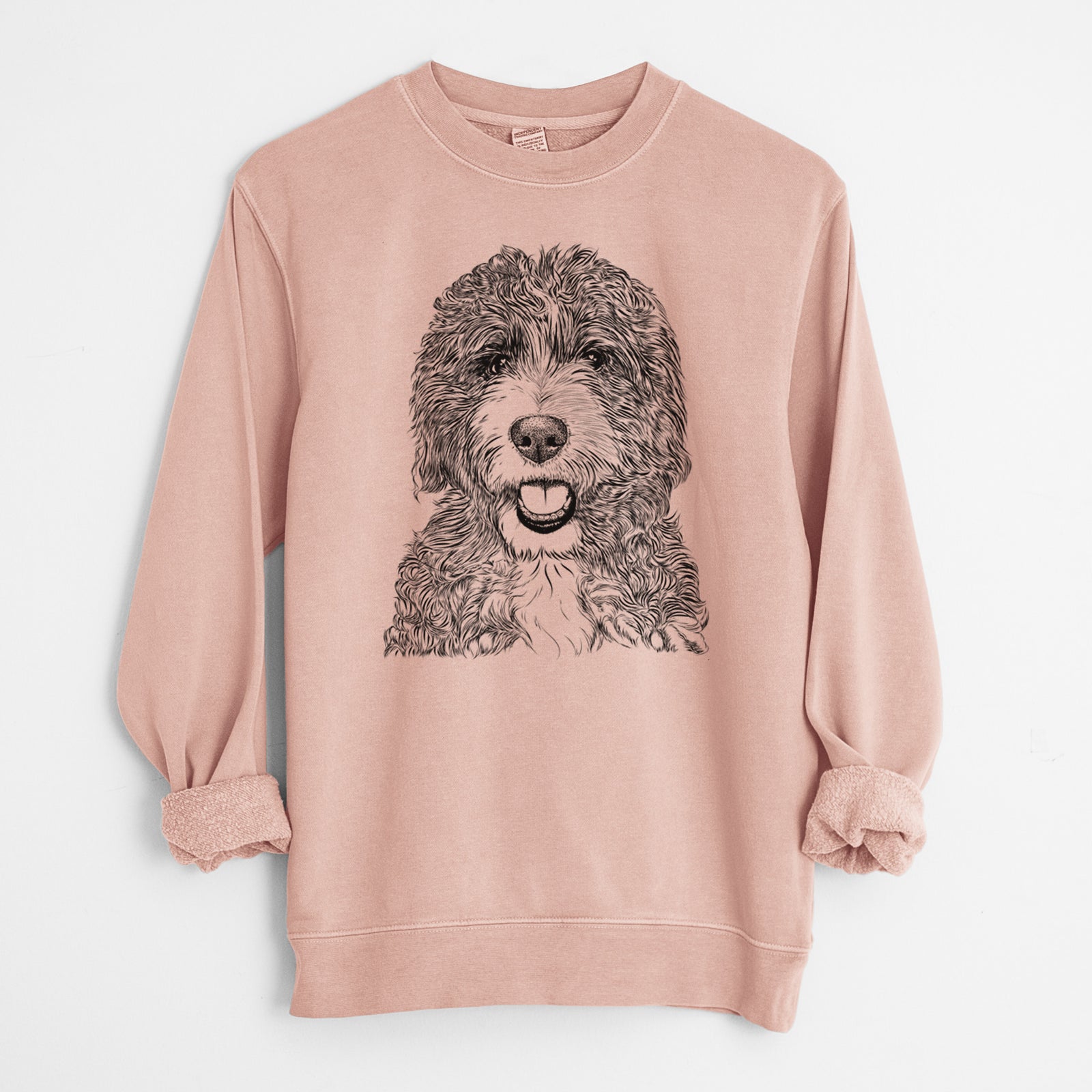 Hand-drawn sketch of Bash the Bernedoodle on a Dusty Pink Unisex pigment dyed crew sweatshirt