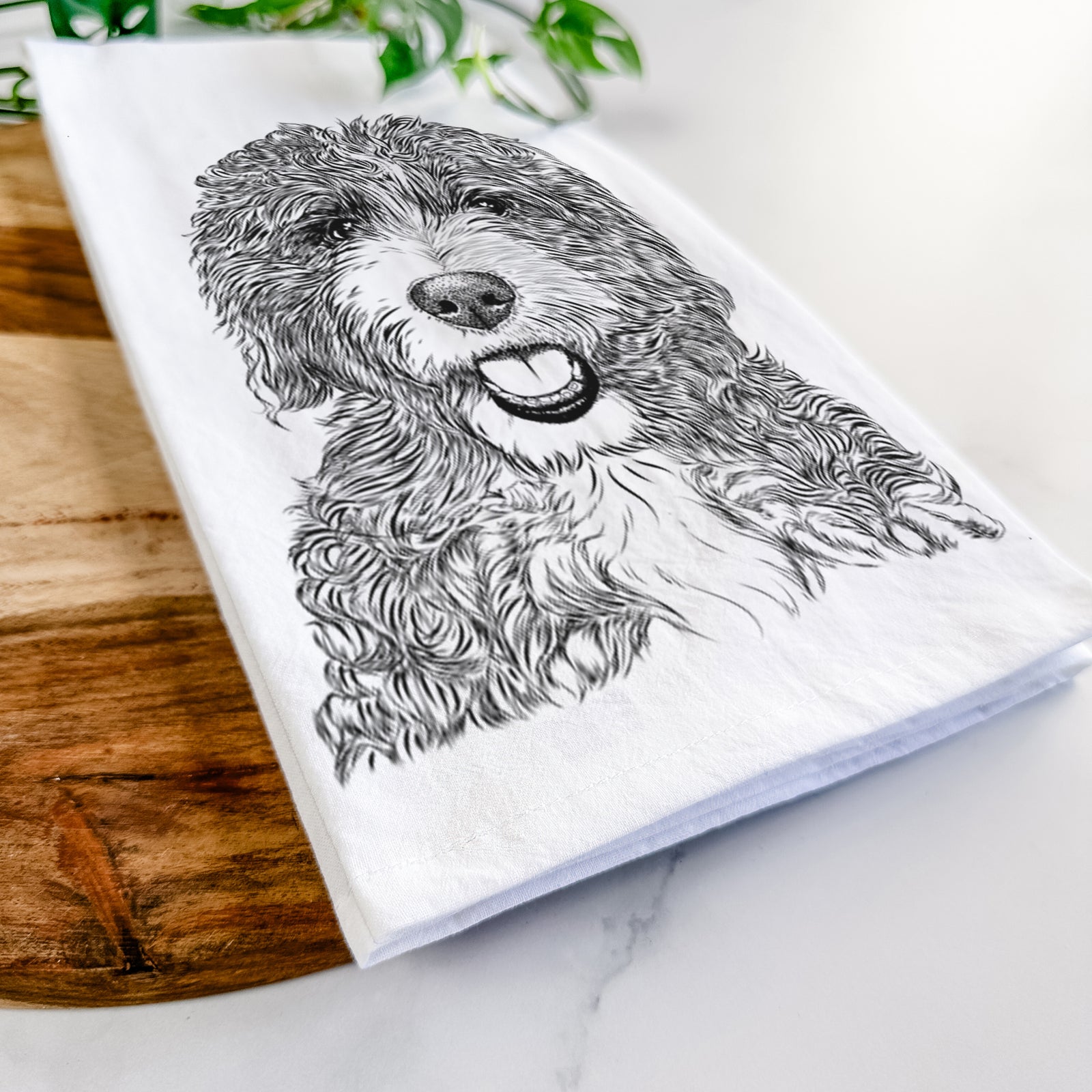Hand-drawn sketch of Bash the Bernedoodle on a tea towel