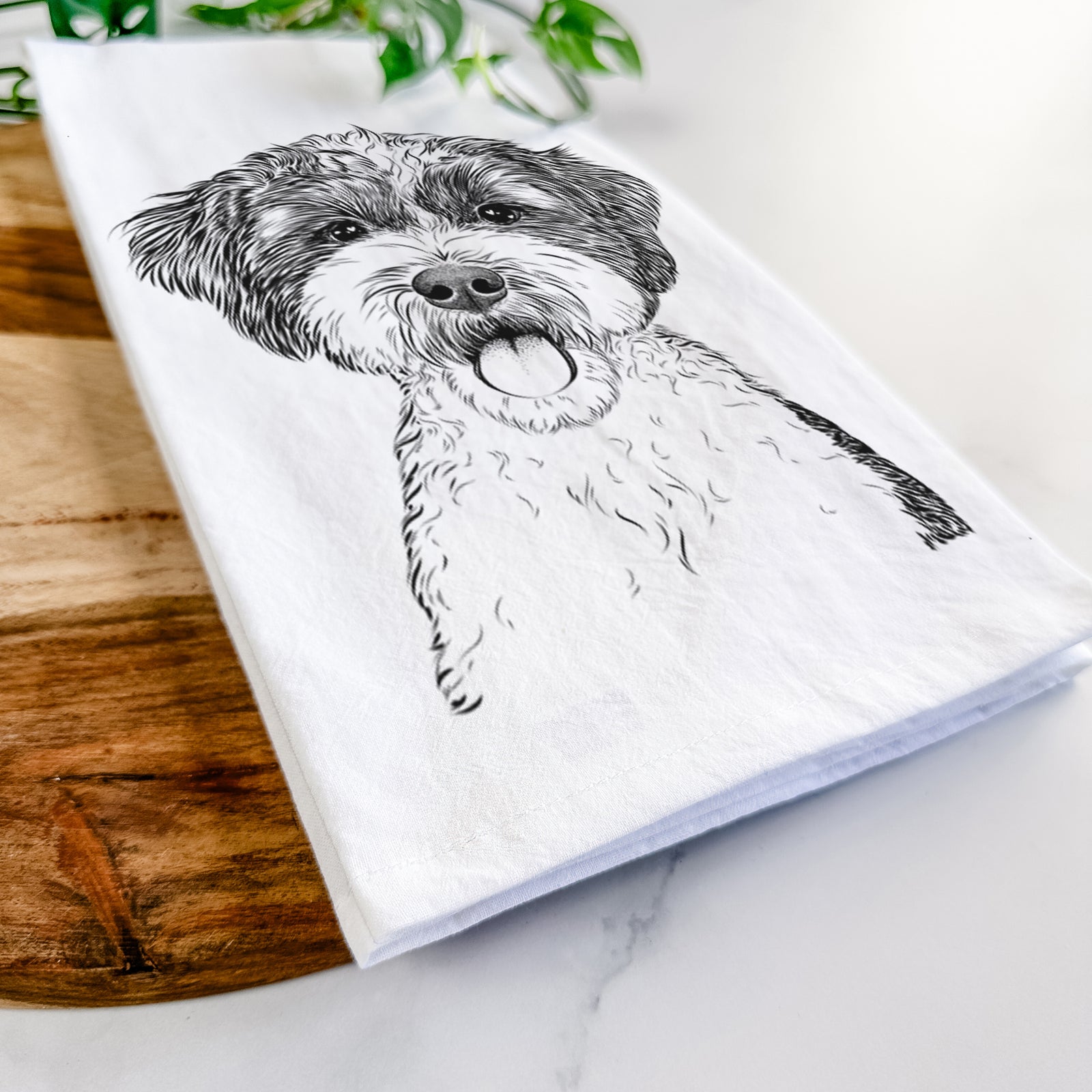 Hand-drawn sketch of Bella the Cockapoo on a tea towel