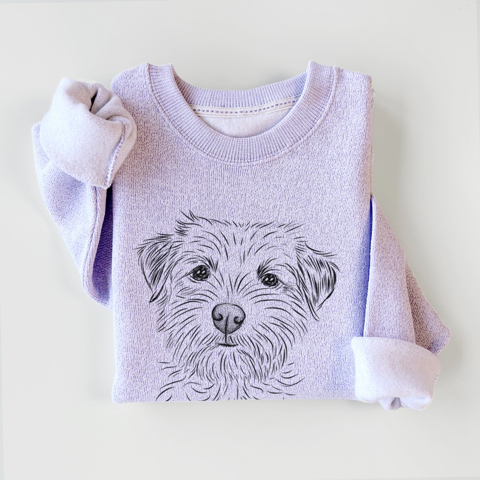 Hand-drawn sketch of Benjamin the Border Terrier on an Ice Purple knit sweatshirt