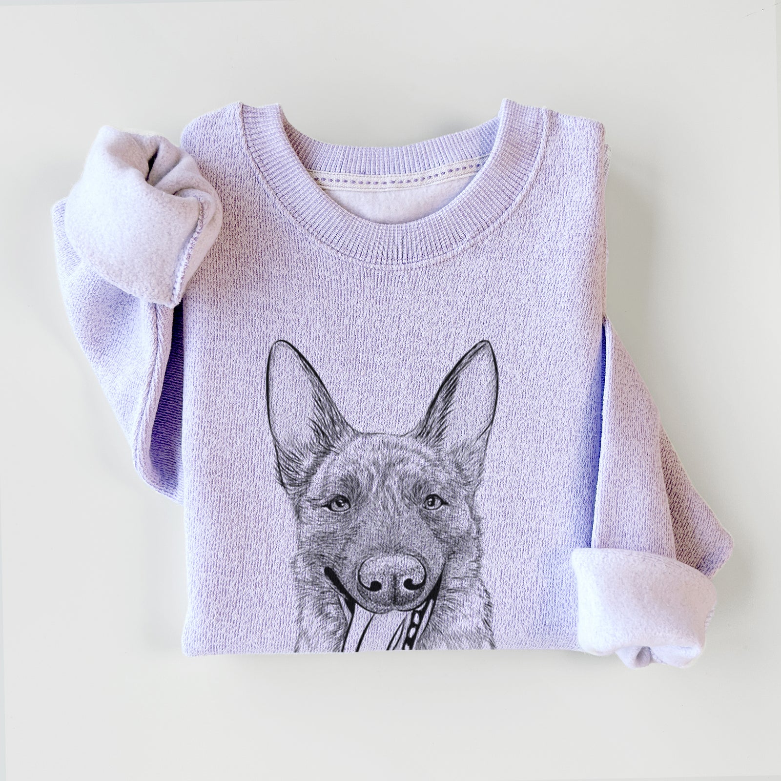 Hand-drawn sketch of Bessa the Dutch Shepherd on an Ice Purple knit sweatshirt
