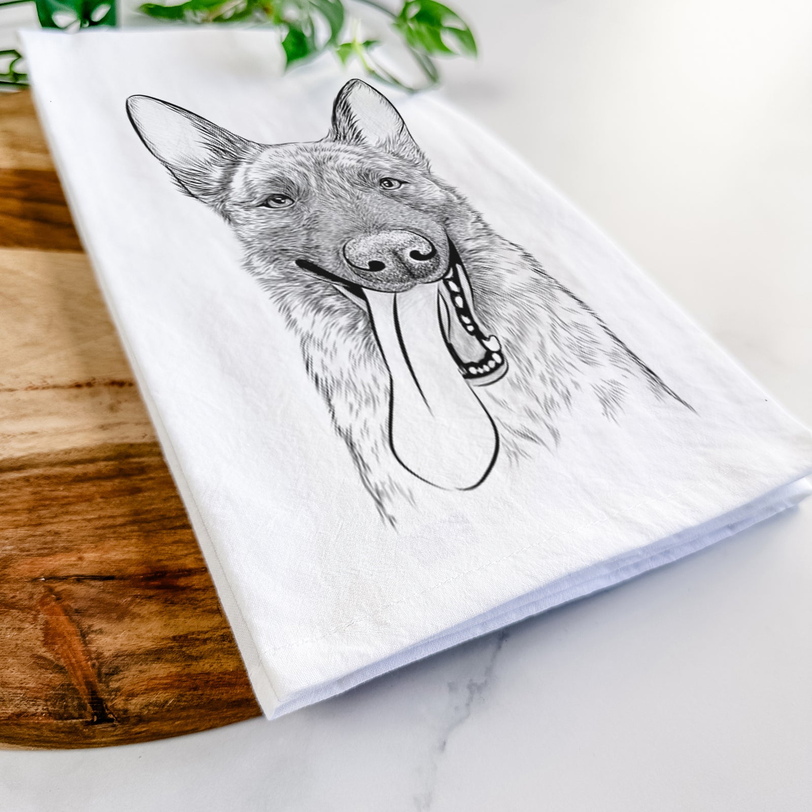 Hand-drawn sketch of Bessa the Dutch Shepherd on a tea towel
