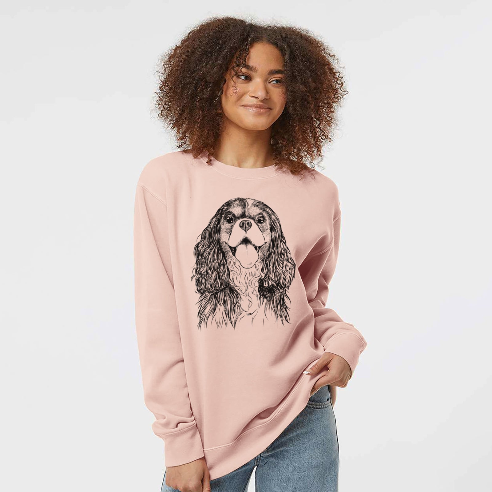 Hand-drawn sketch of Brandy the Cavalier King Charles Spaniel on a Dusty Pink Unisex pigment dyed crew sweatshirt