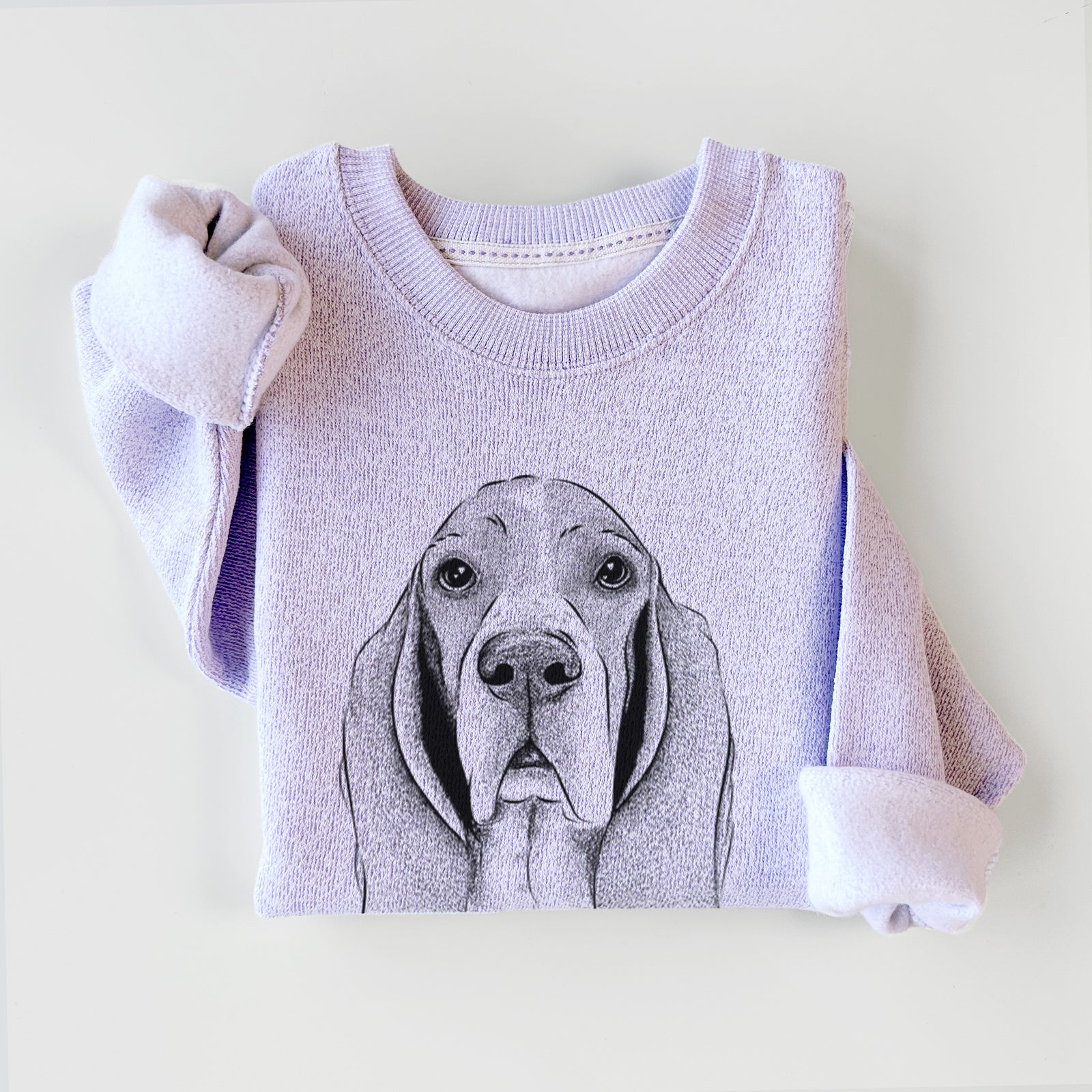 Hand-drawn sketch of Buckley the Basset Hound on an Ice Purple knit sweatshirt