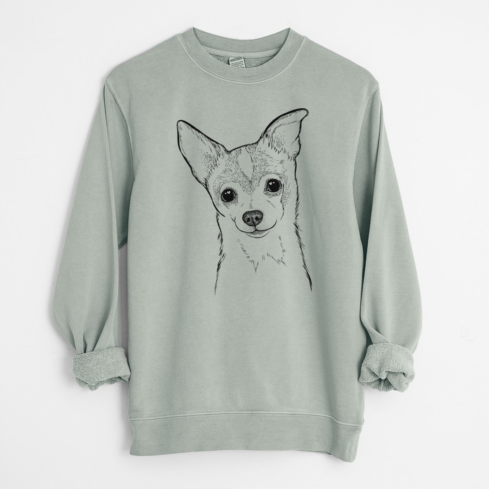 Hand-drawn sketch of Buggy the Chihuahua on a Sage Unisex pigment dyed crew sweatshirt
