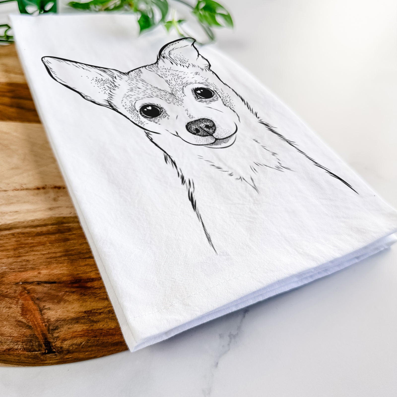 Hand-drawn sketch of Buggy the Chihuahua on a tea towel
