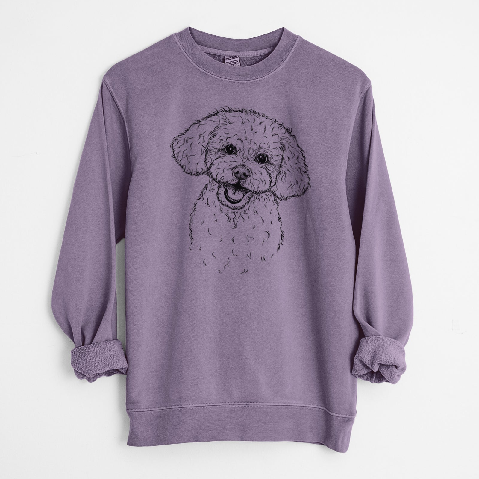 Hand-drawn sketch of Caesar the Bichon Frise on a Plum Unisex pigment dyed crew sweatshirt