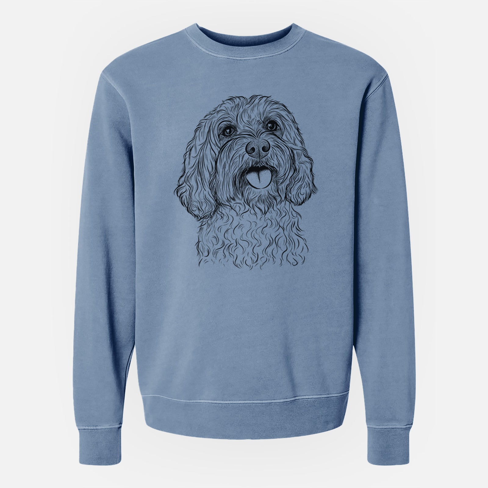Hand-drawn sketch of Cali the Cavapoo on a Slate Blue Unisex pigment dyed crew sweatshirt