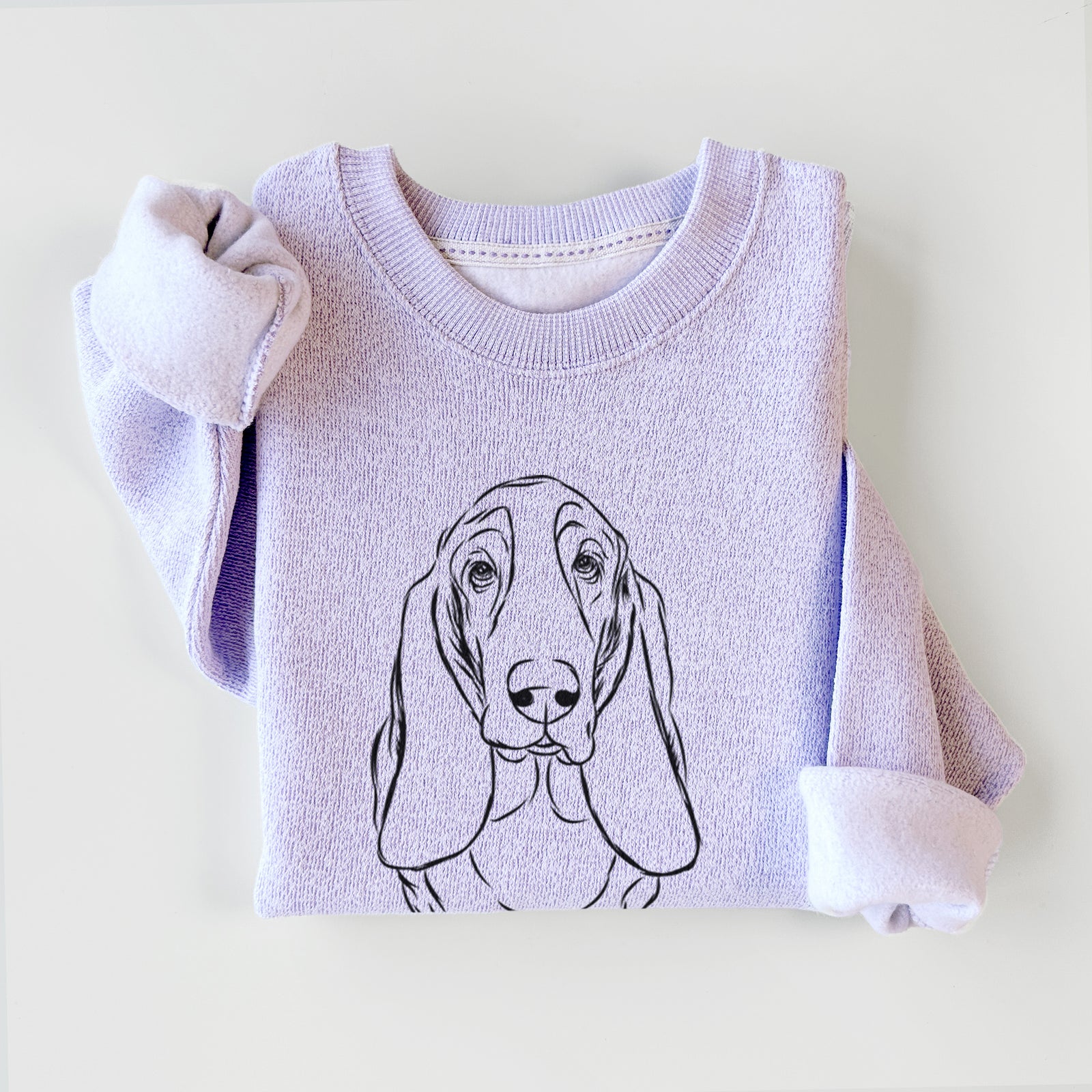 Hand-drawn sketch of Charlie the Basset Hound on an Ice Purple knit sweatshirt