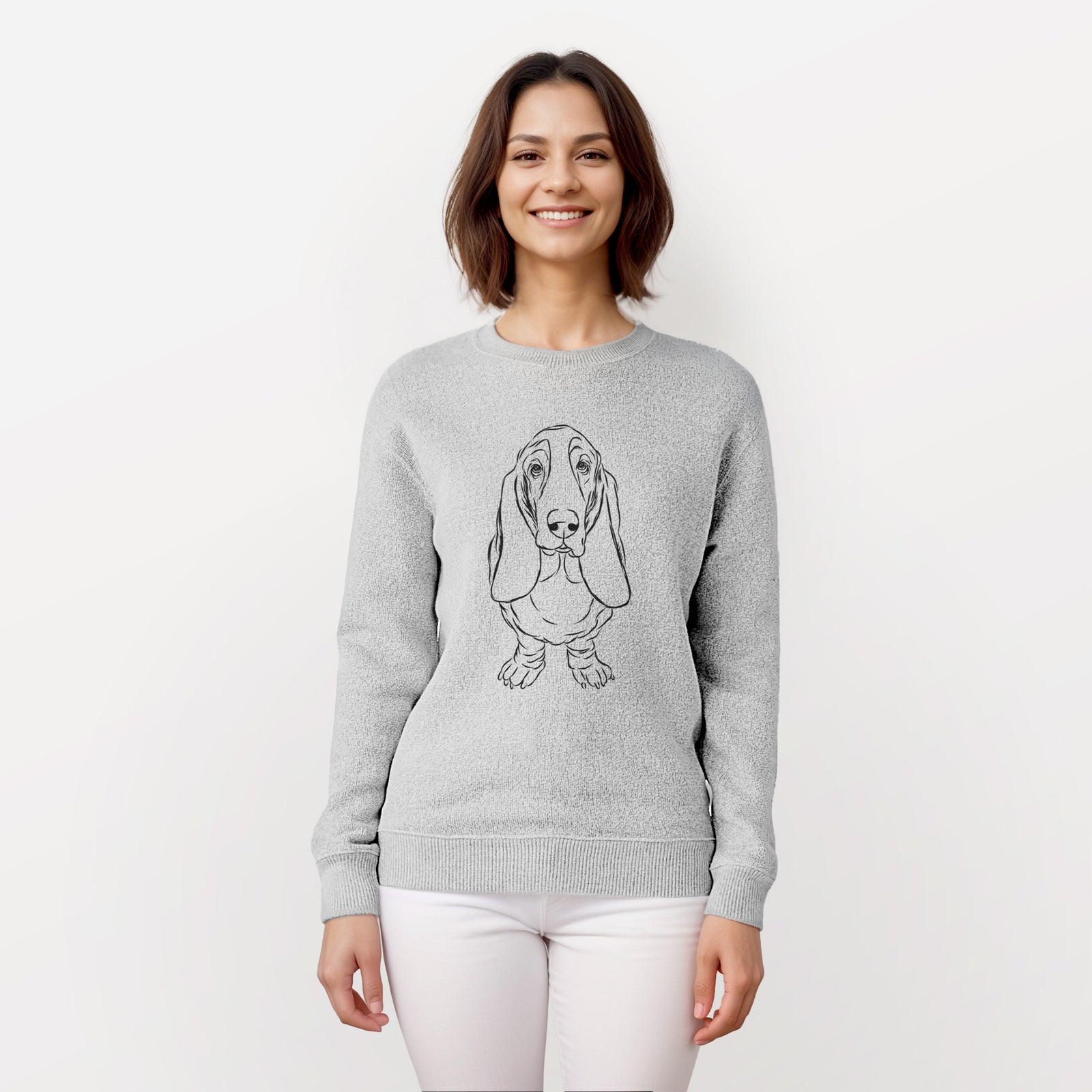 Hand-drawn sketch of Charlie the Basset Hound on a knit sweatshirt, worn by a woman