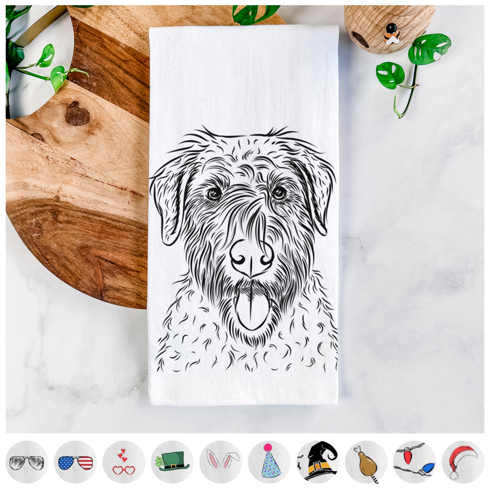 Hand-drawn sketch of Chester the Soft Coated Wheaten Terrier on a tea towel, shown with icons of the other available costume styles