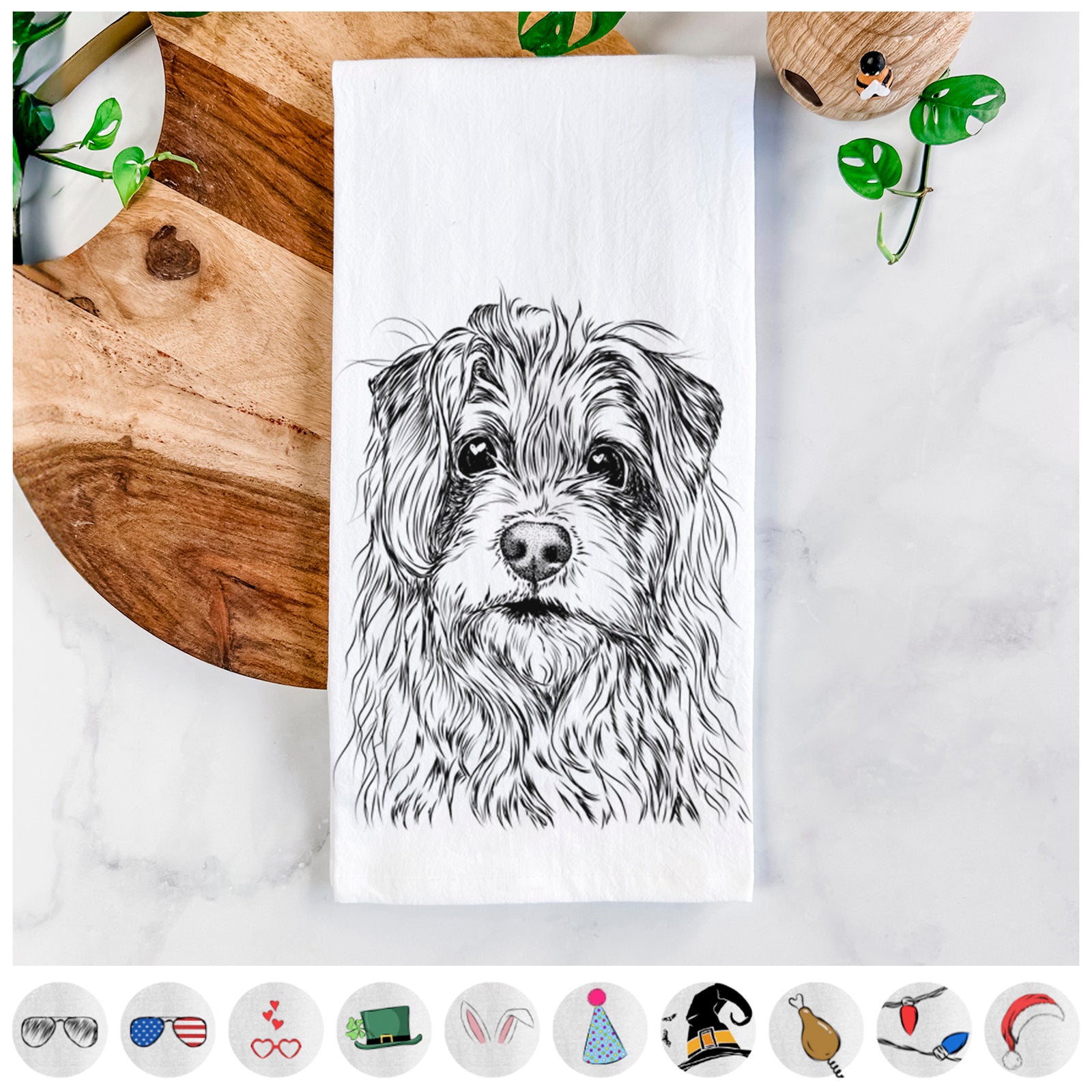 Hand-drawn sketch of Chester the Terrier Mix on a tea towel, shown with icons of the other available costume styles