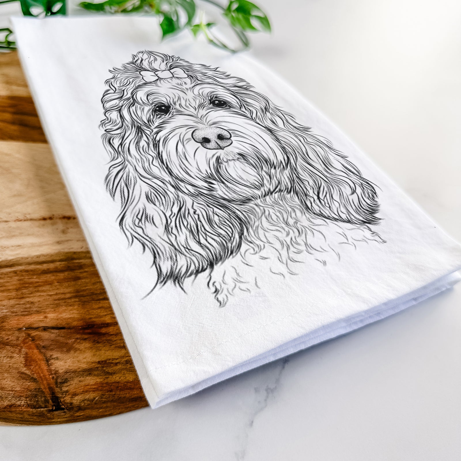 Hand-drawn sketch of Chloe the Cockapoo on a tea towel