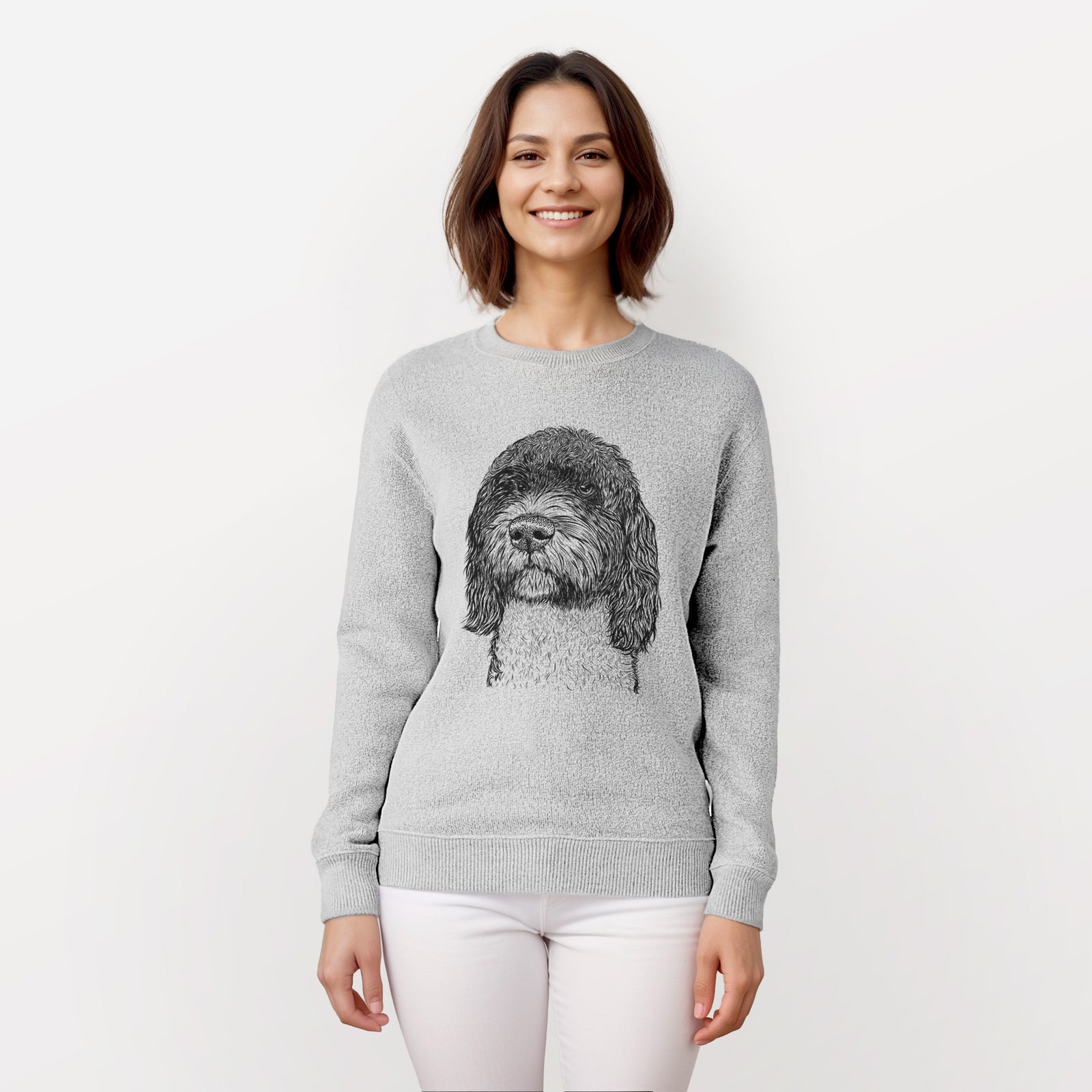 Hand-drawn sketch of Chris the Portuguese Water Dog on a knit sweatshirt, worn by a woman