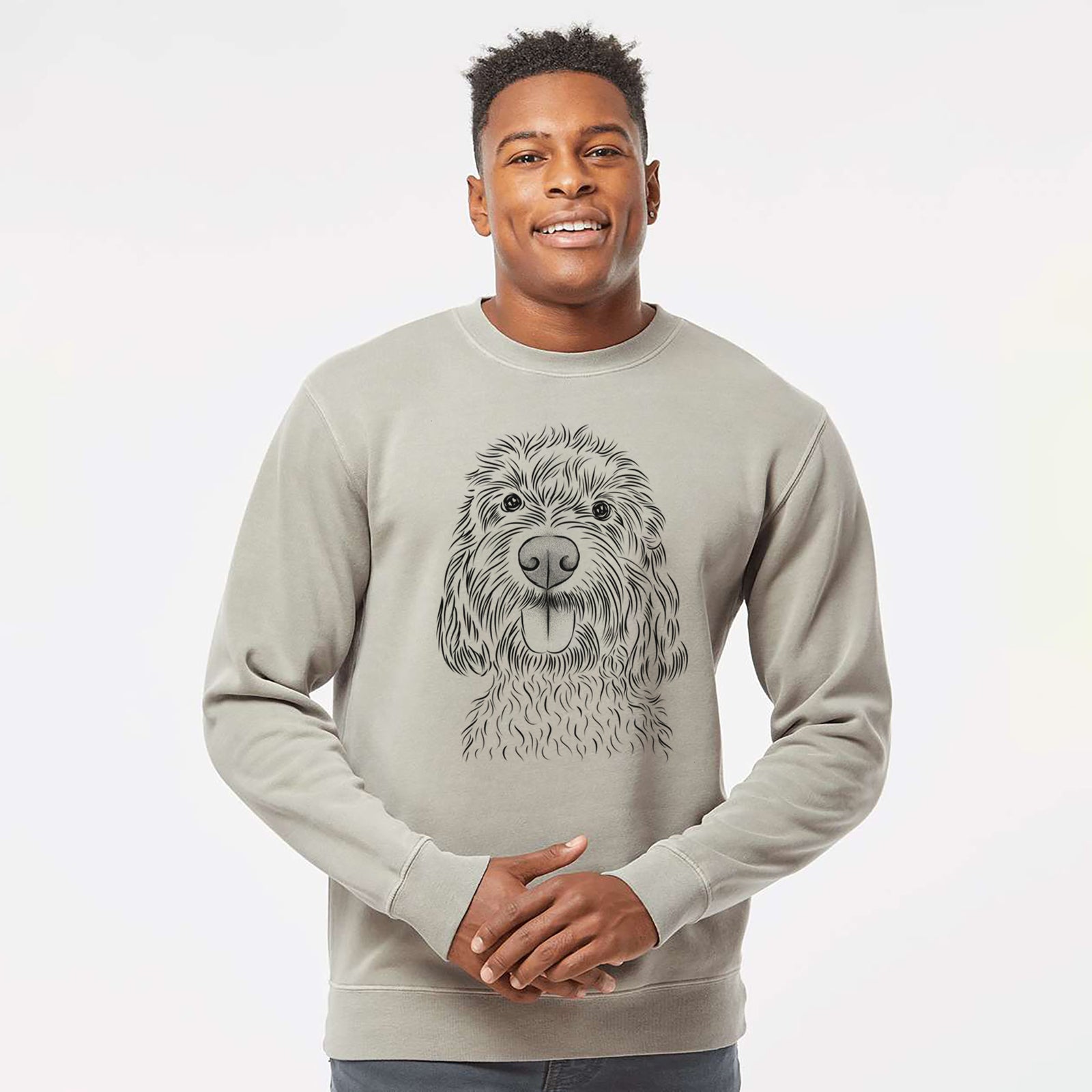 Hand-drawn sketch of Clover the Cockapoo on a Cement Unisex pigment dyed crew sweatshirt