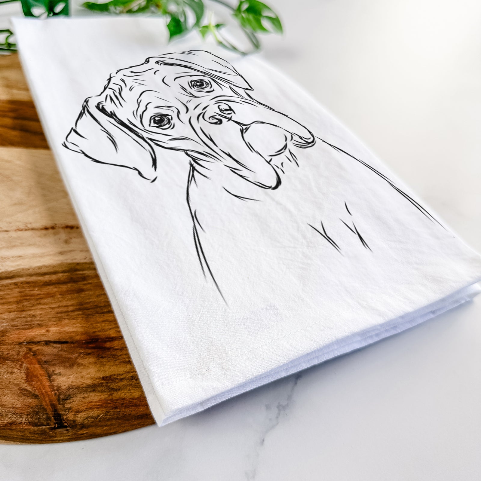 Hand-drawn sketch of Cooper the Boxer on a tea towel