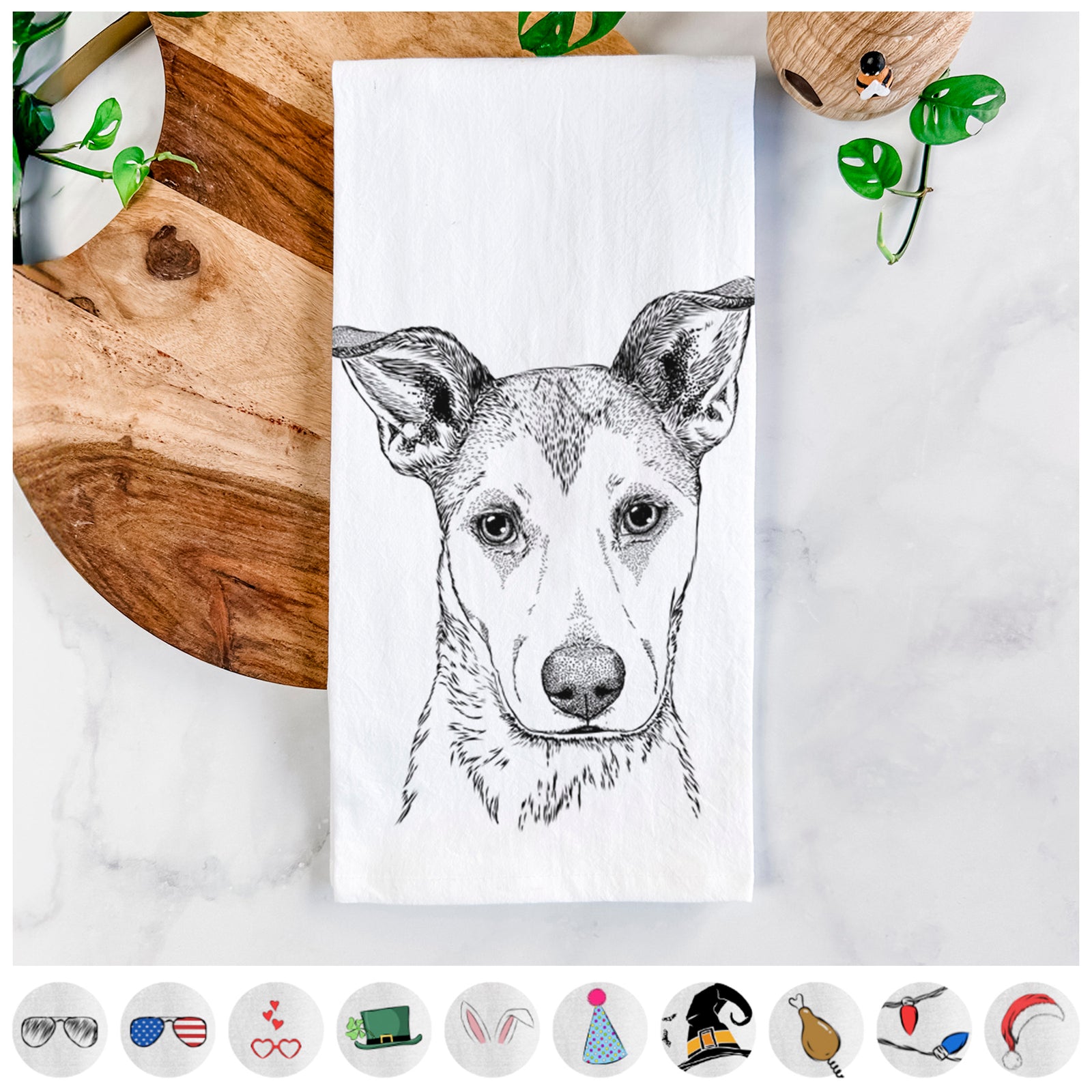 Hand-drawn sketch of Coral the Mixed Breed on a tea towel, shown with icons of the other available costume styles