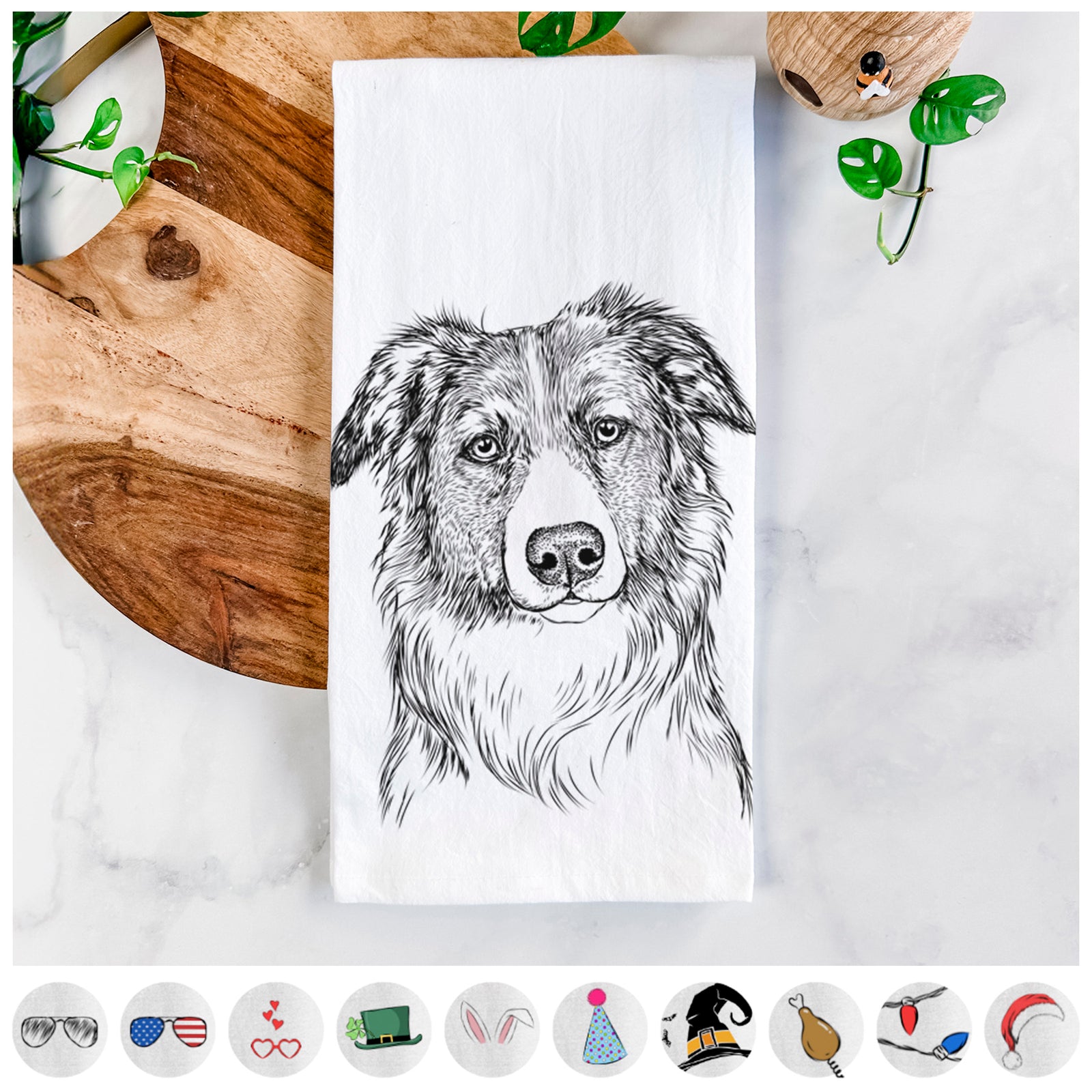 Hand-drawn sketch of Cynder the English Shepherd on a tea towel, shown with icons of the other available costume styles
