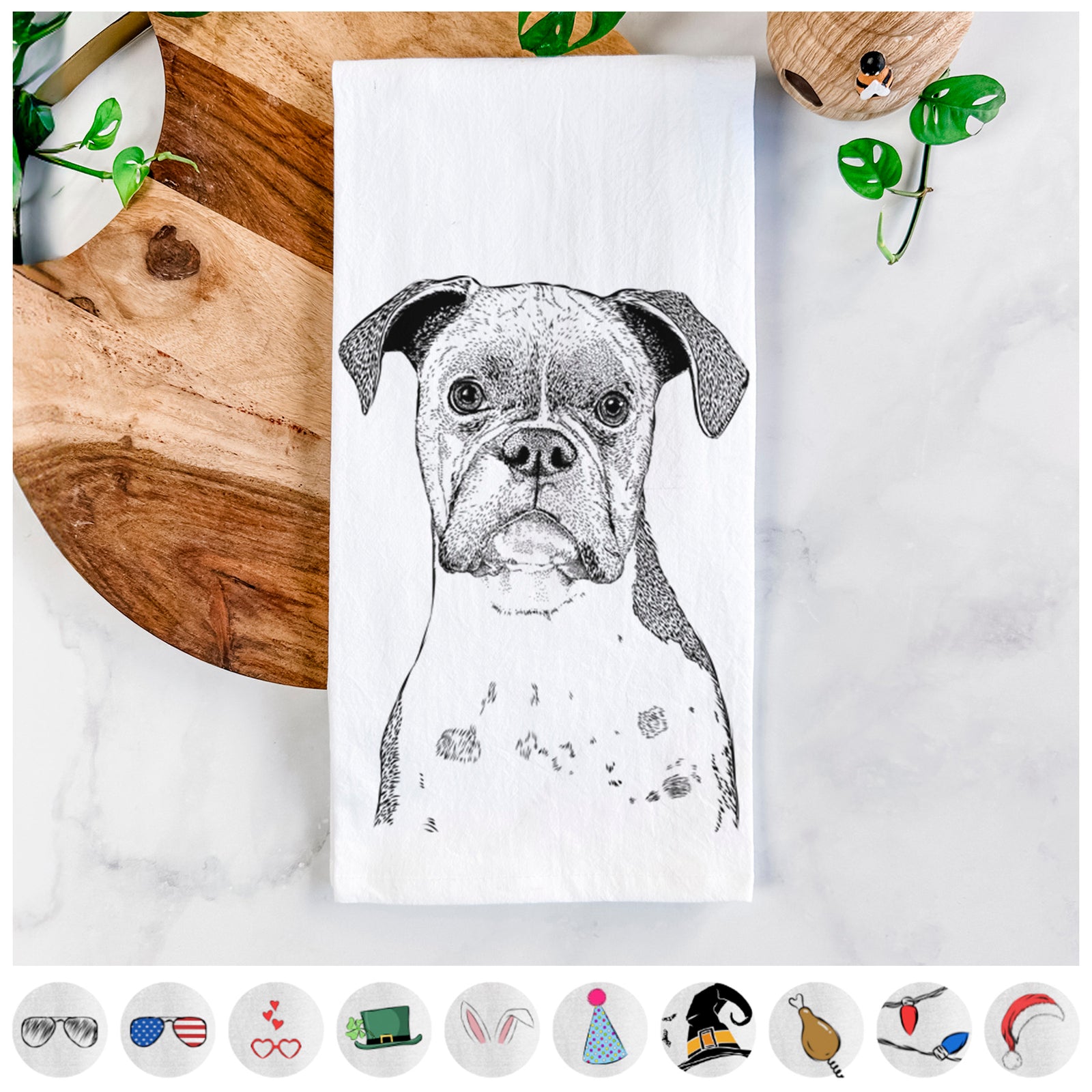 Hand-drawn sketch of Daisy the Boxer on a tea towel, shown with icons of the other available costume styles