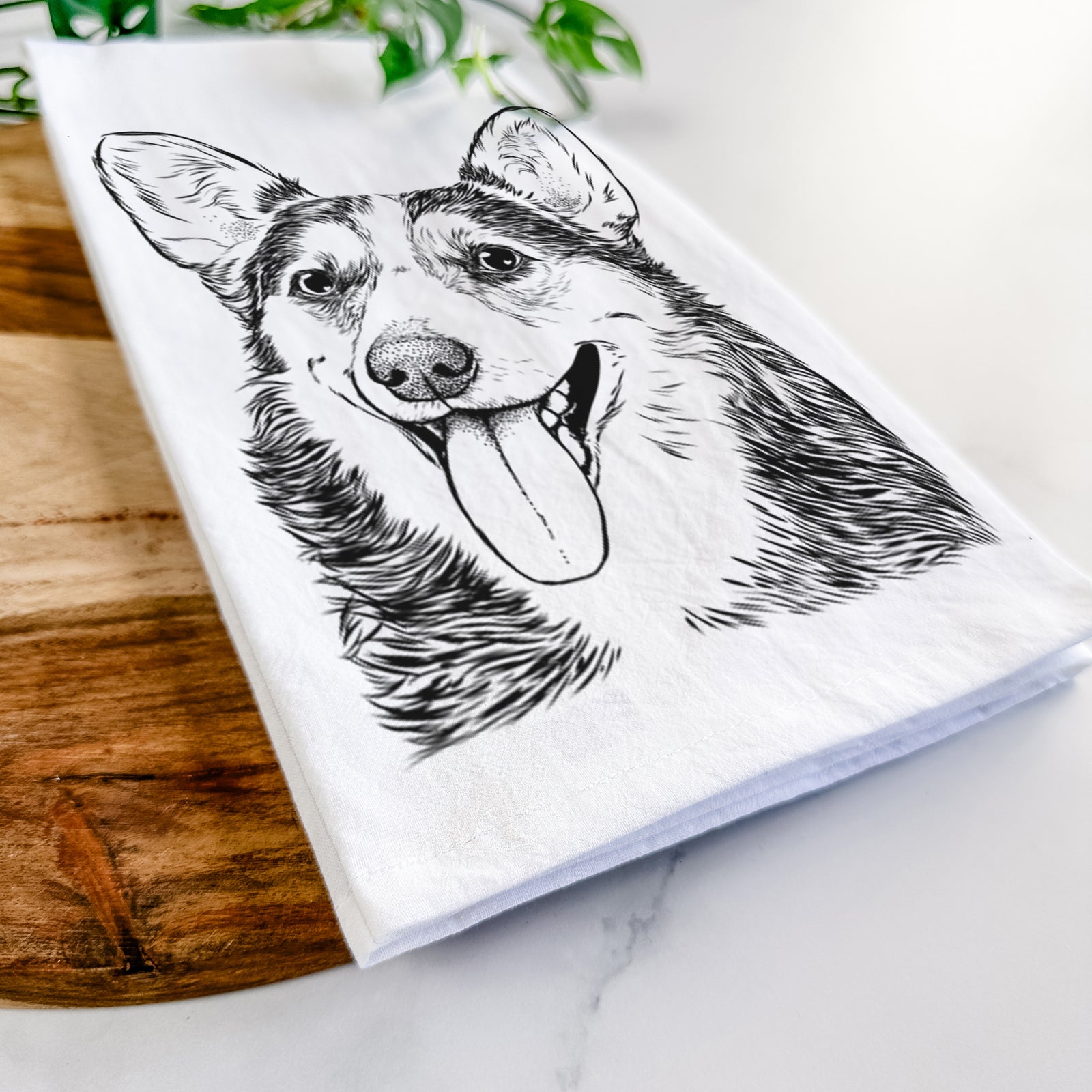 Hand-drawn sketch of Darma the Corgi on a tea towel