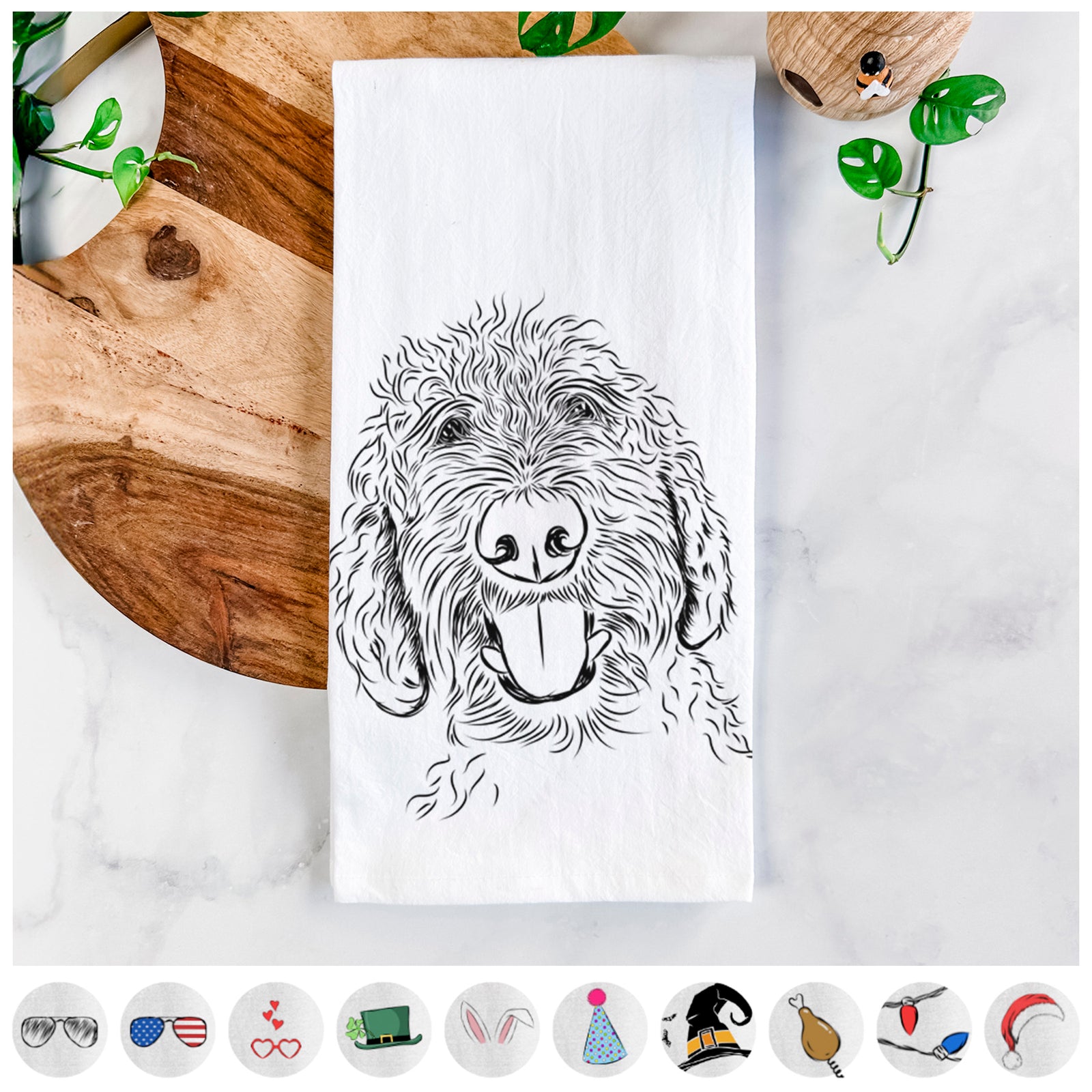 Hand-drawn sketch of Dixie the Doodle on a tea towel, shown with icons of the other available costume styles