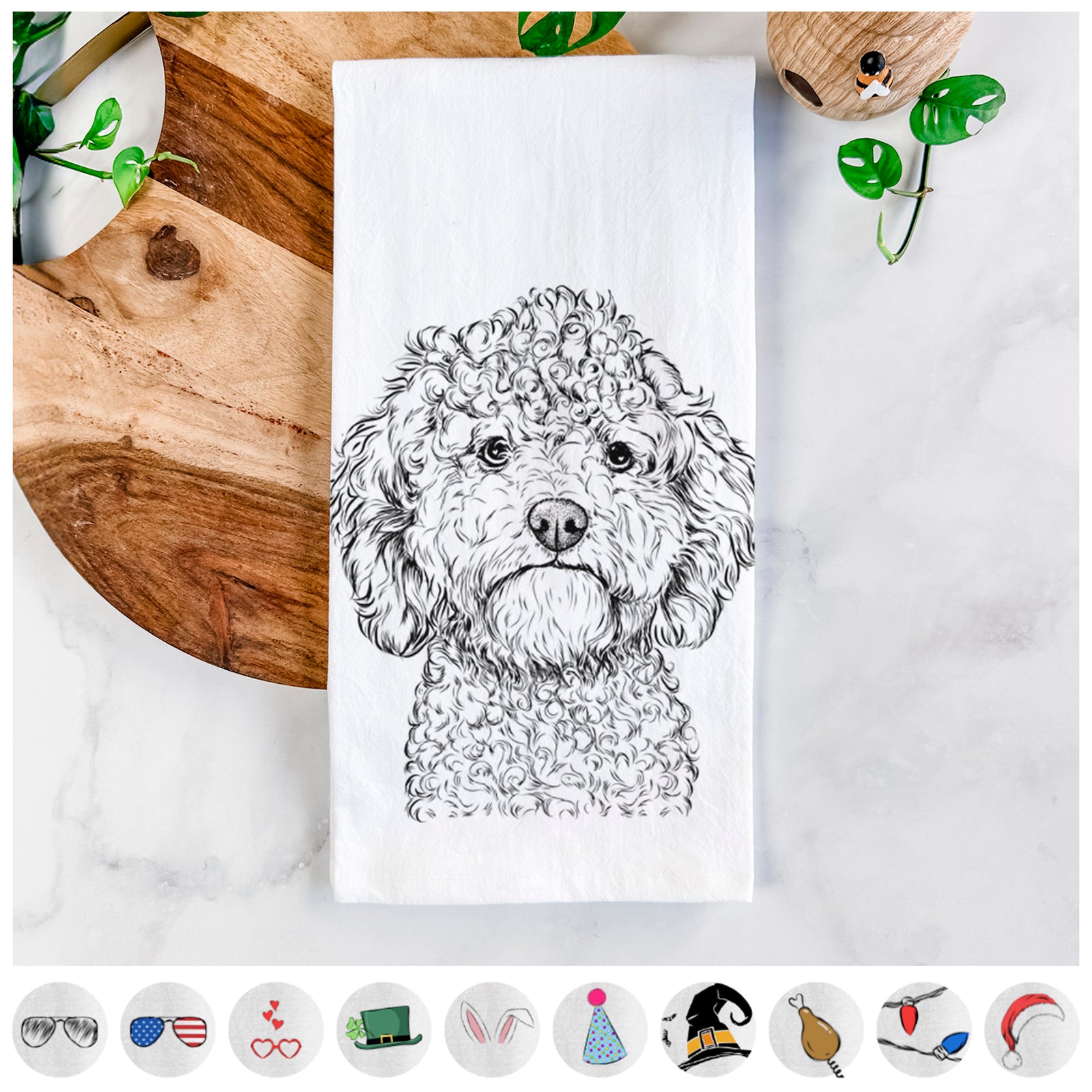 Hand-drawn sketch of Edgar the Shihpoo on a tea towel, shown with icons of the other available costume styles