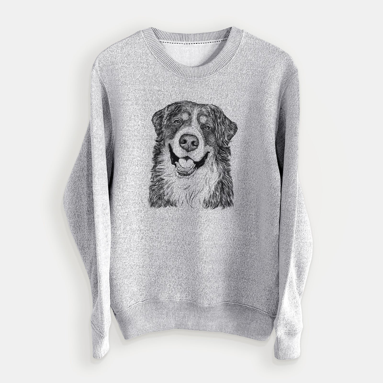 Hand-drawn sketch of Eiger the Bernese Mountain Dog on a Salt Pepper knit sweatshirt