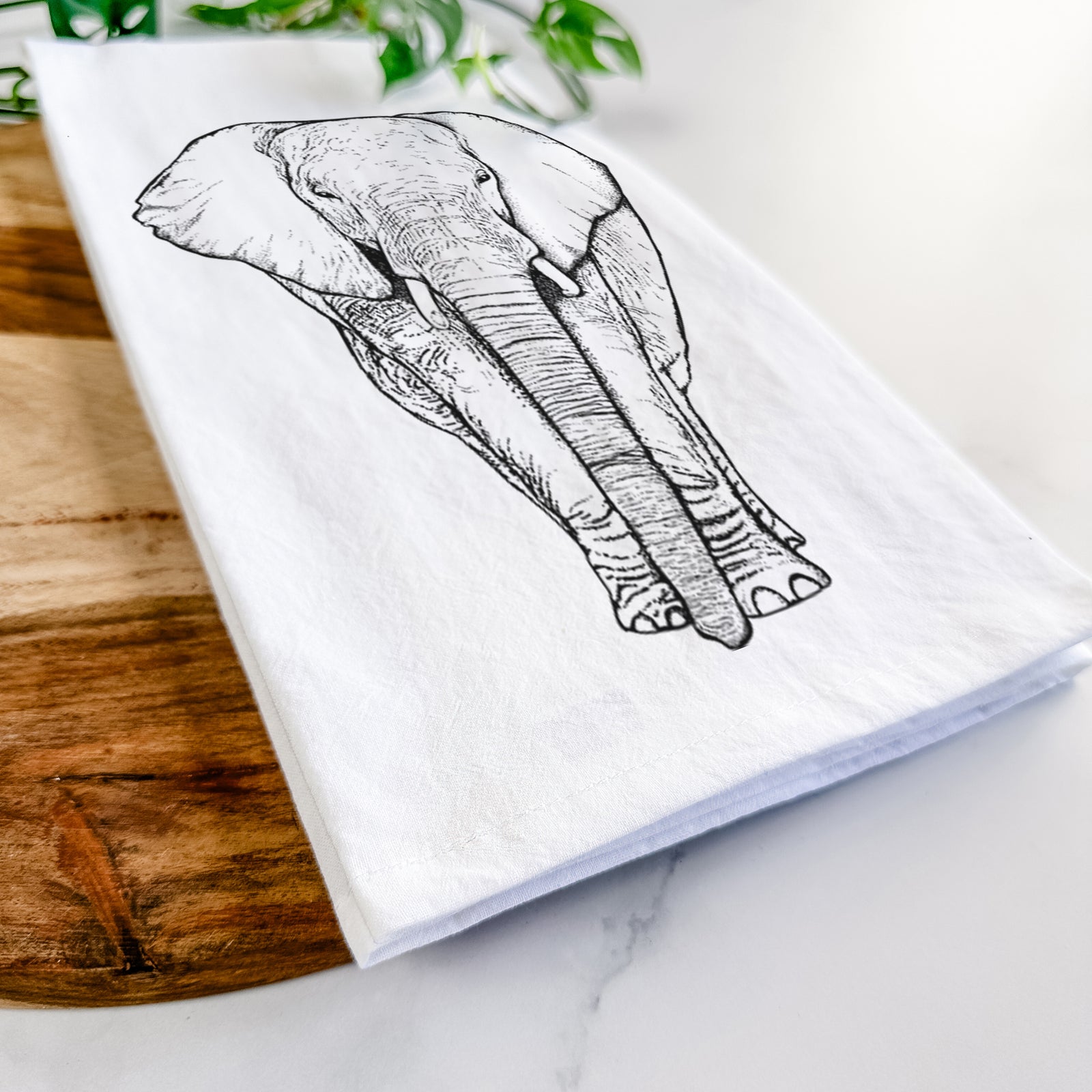 Hand-drawn sketch of Ella the Elephant on a tea towel