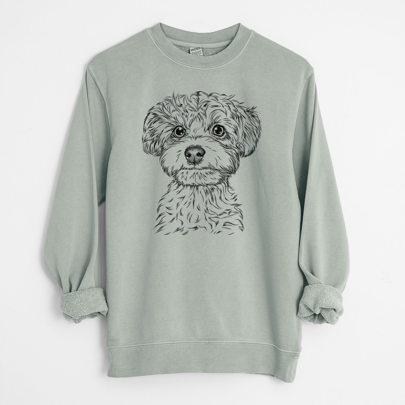 Hand-drawn sketch of Elliott the Yorkiepoo on a Sage Unisex pigment dyed crew sweatshirt