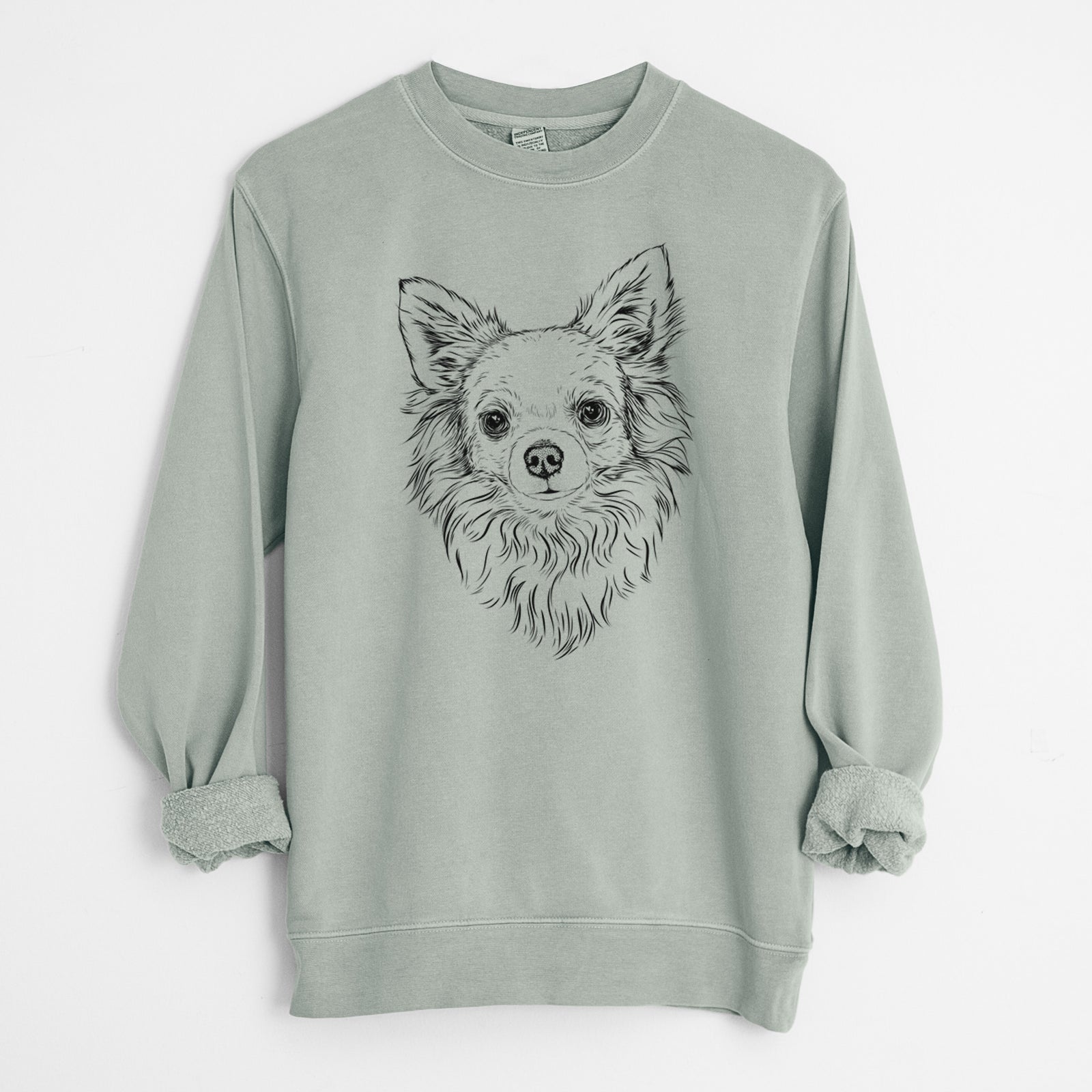 Hand-drawn sketch of Emma the Longhaired Chihuahua on a Sage Unisex pigment dyed crew sweatshirt