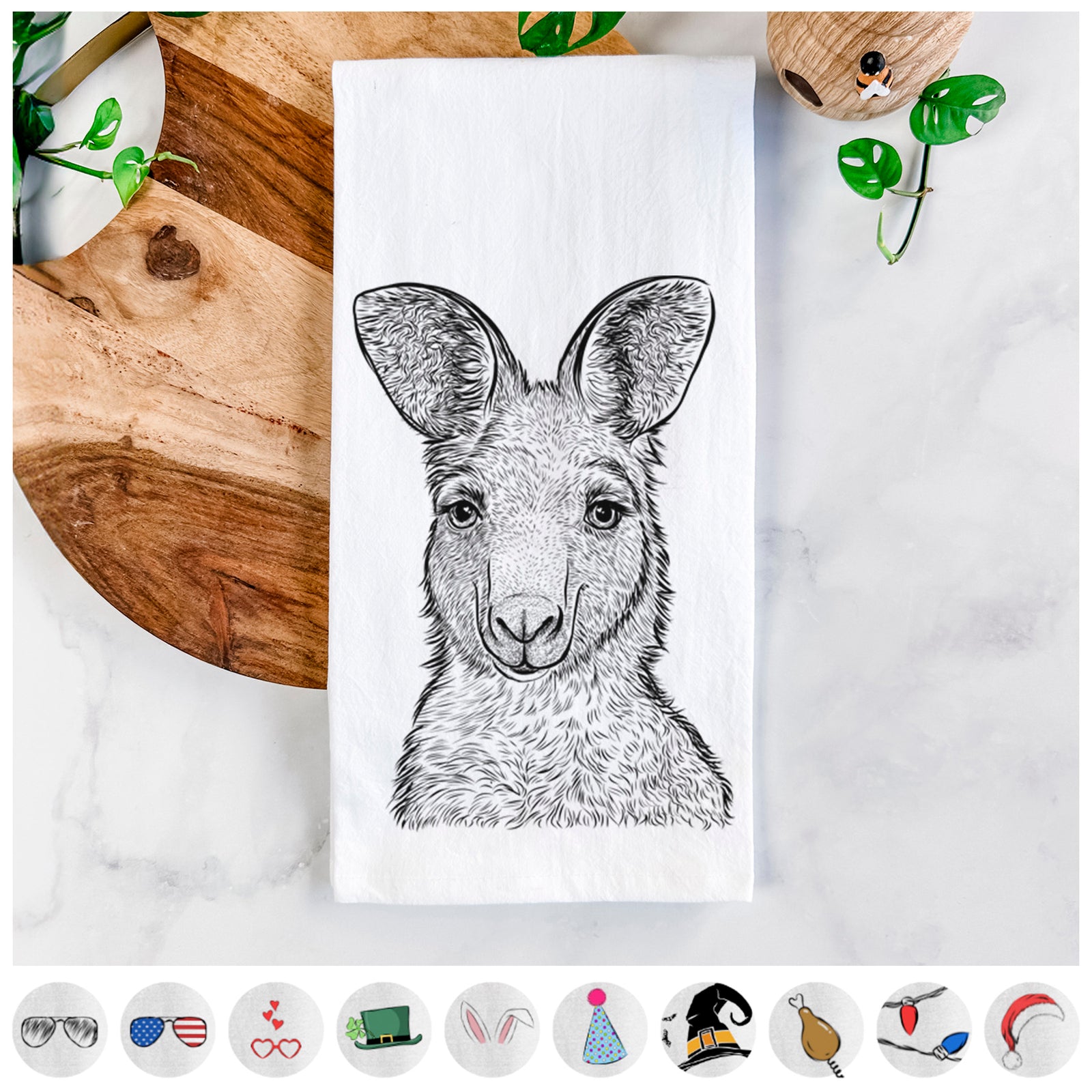 Hand-drawn sketch of Evelyn the Eastern Grey Kangaroo on a tea towel, shown with icons of the other available costume styles