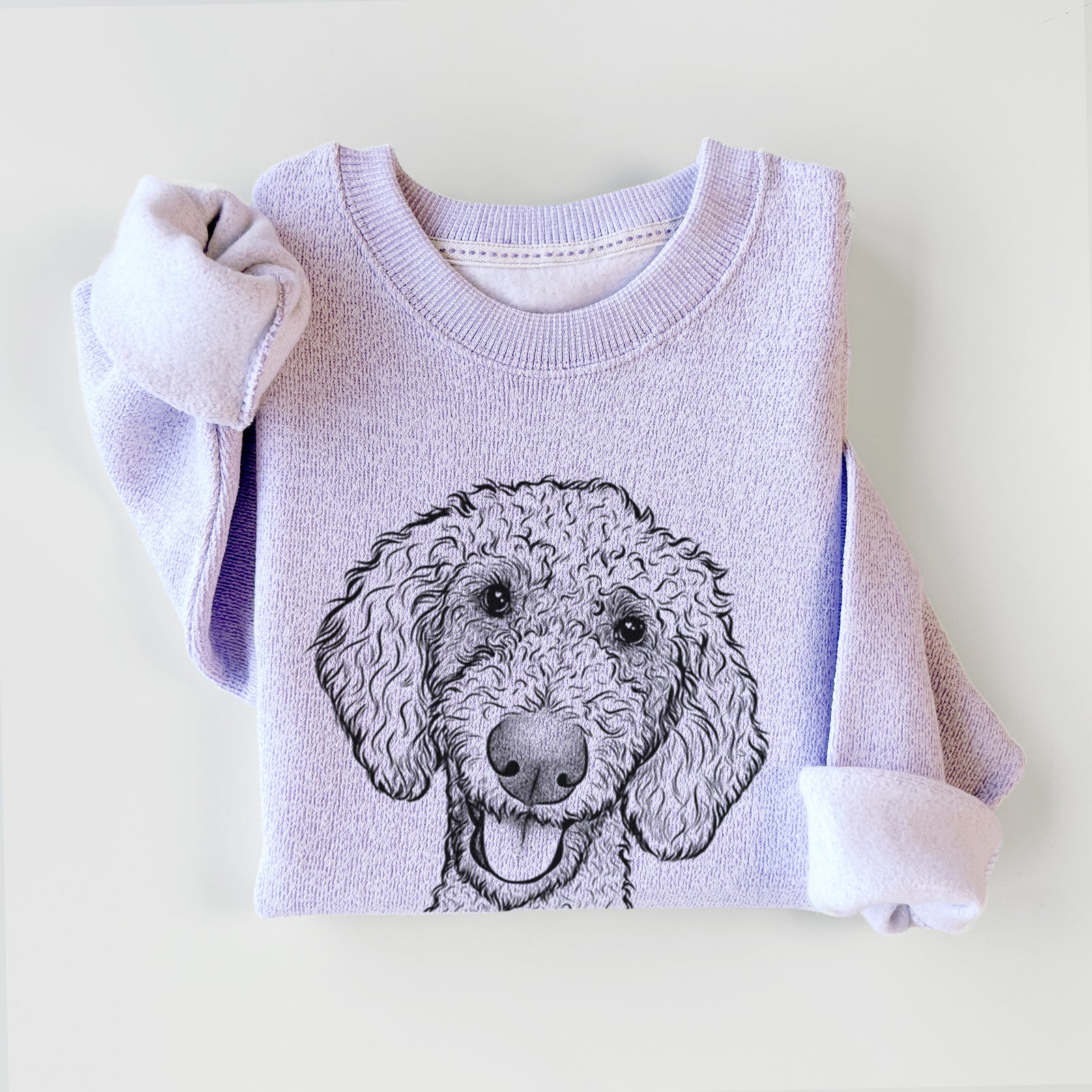 Hand-drawn sketch of Fenway the Goldendoodle on an Ice Purple knit sweatshirt