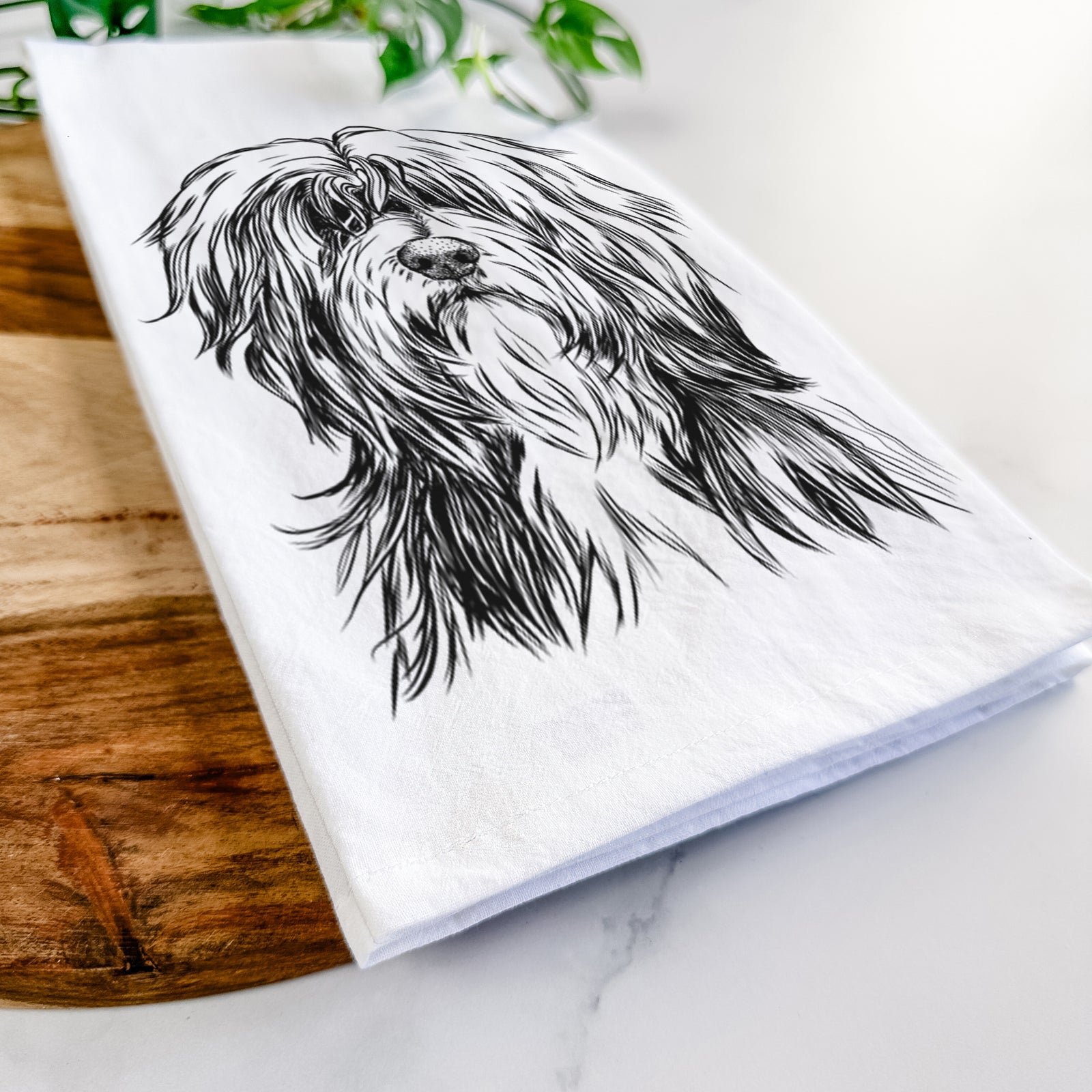 Hand-drawn sketch of Fiji the Polish Lowland Sheepdog on a tea towel