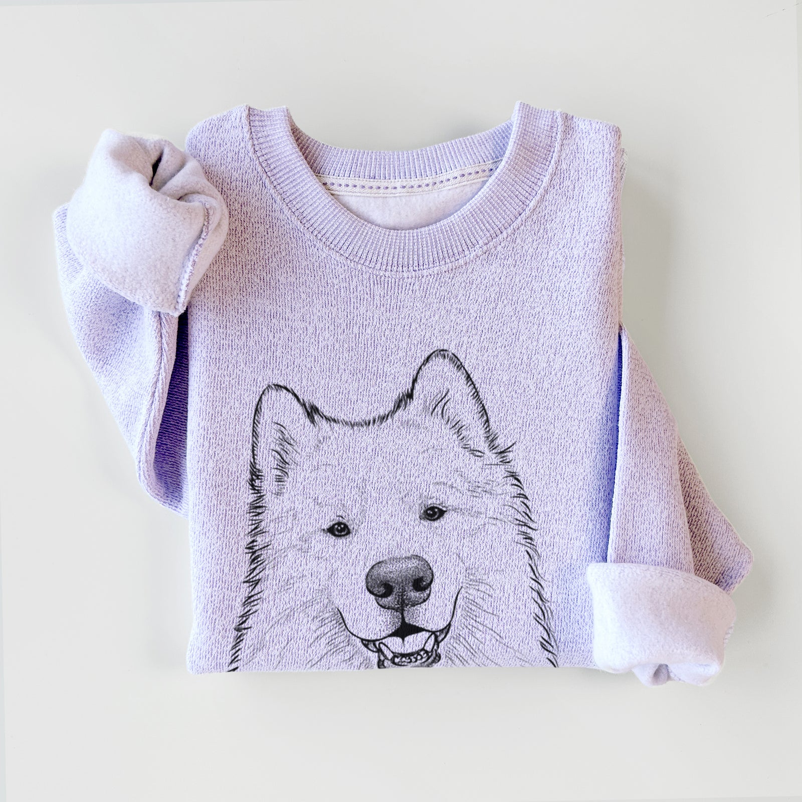 Hand-drawn sketch of Foster the Samoyed on an Ice Purple knit sweatshirt