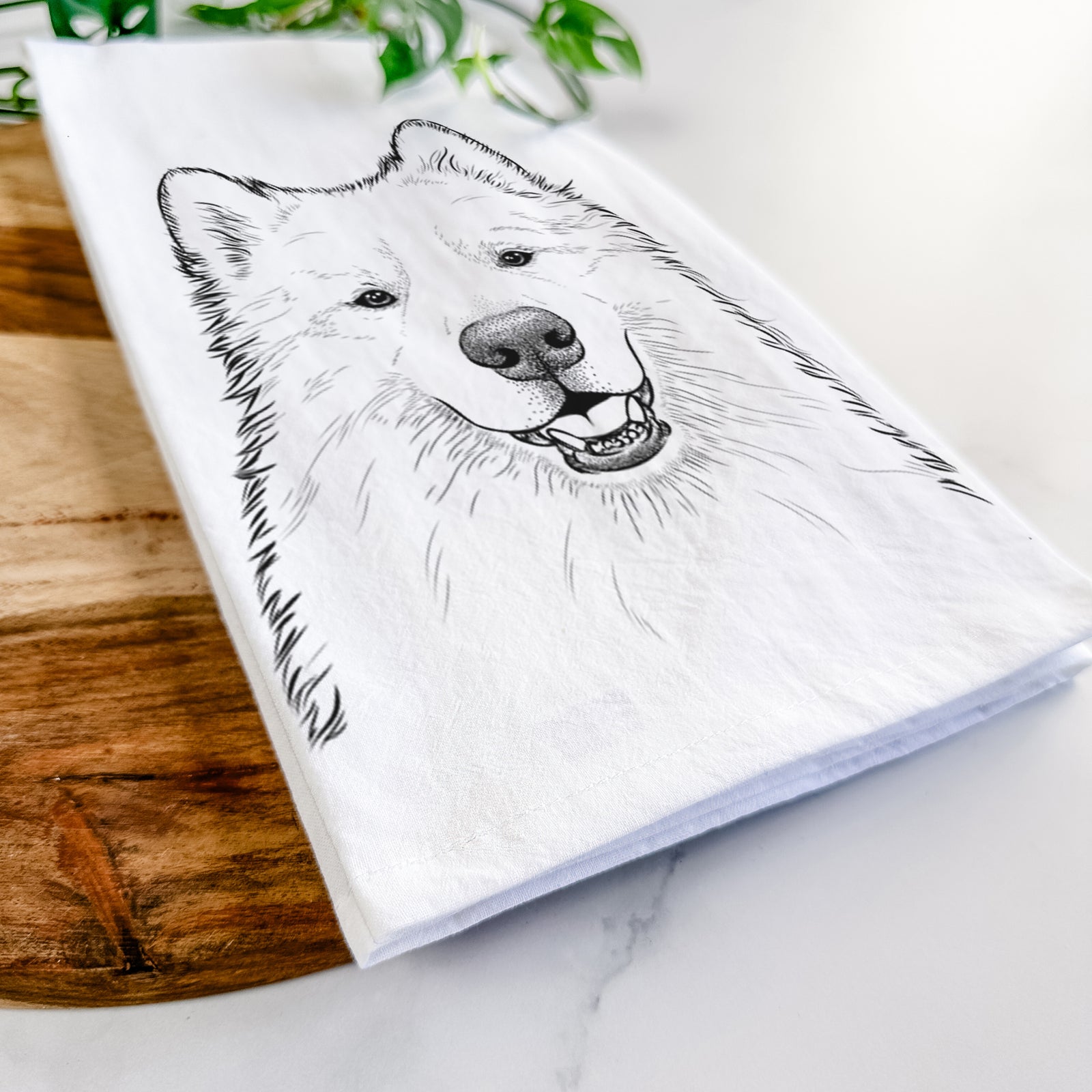 Hand-drawn sketch of Foster the Samoyed on a tea towel