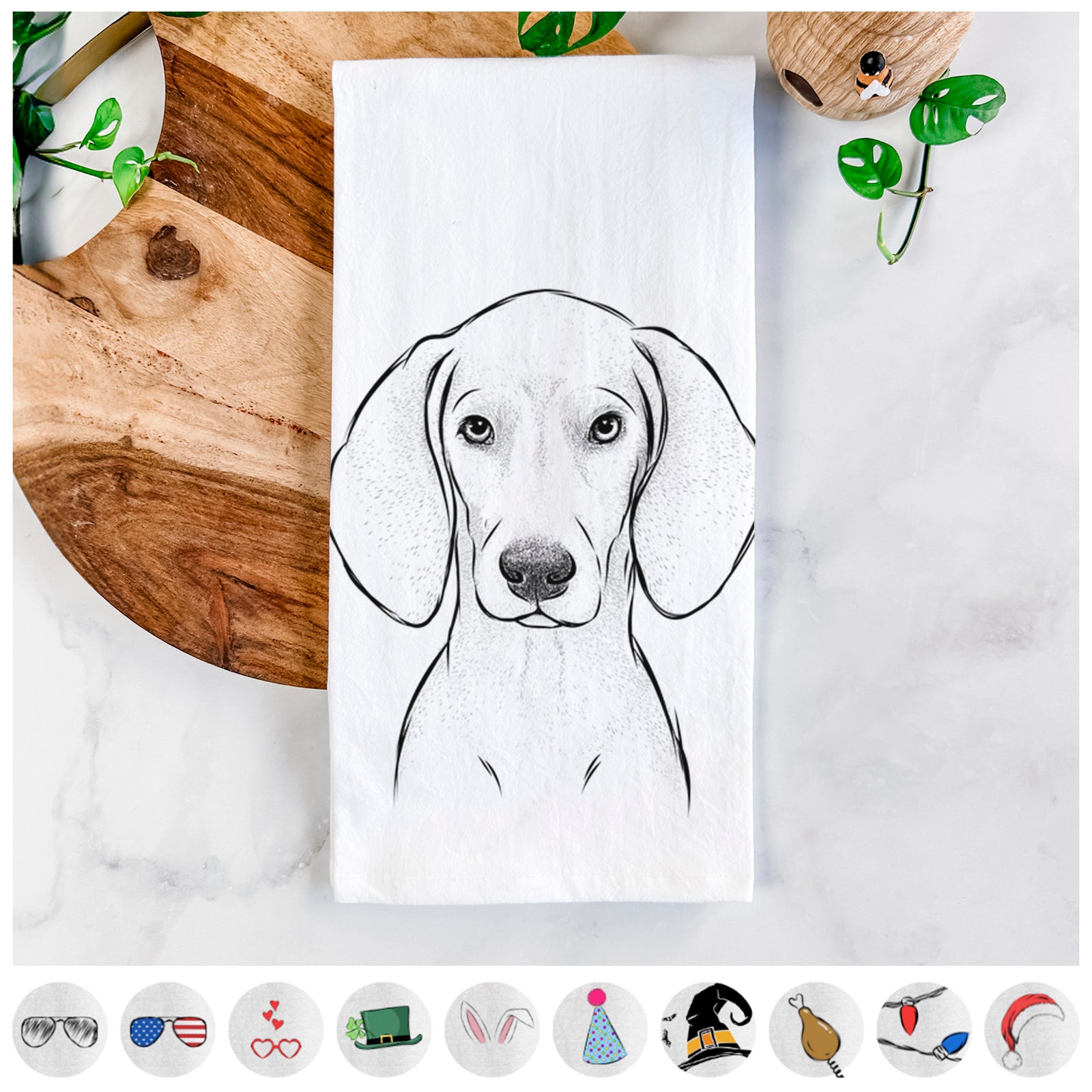Hand-drawn sketch of Frejya the Weimaraner on a tea towel, shown with icons of the other available costume styles