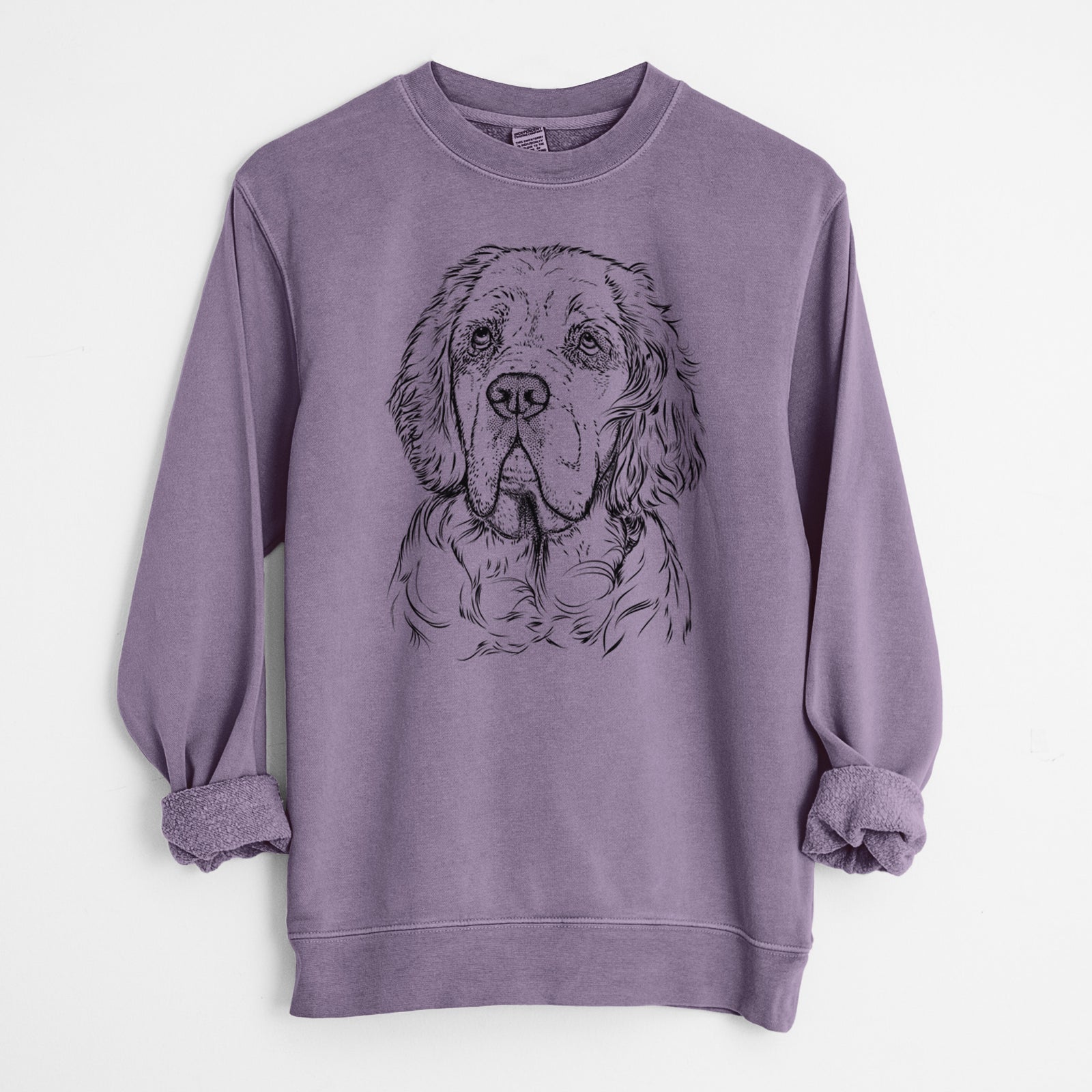 Hand-drawn sketch of Gary the Clumber Spaniel on a Plum Unisex pigment dyed crew sweatshirt