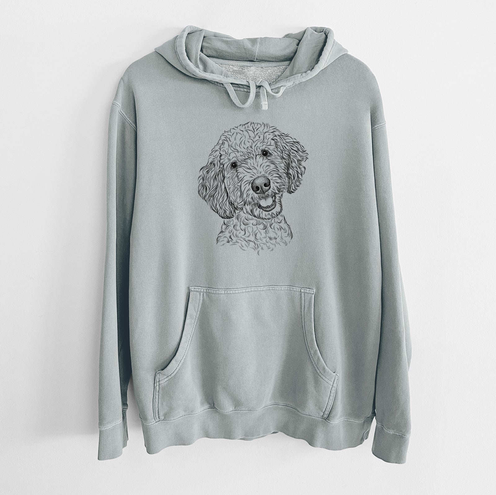Hand-drawn sketch of Gizmo the Goldendoodle on a Sage Unisex pigment dyed hoodie